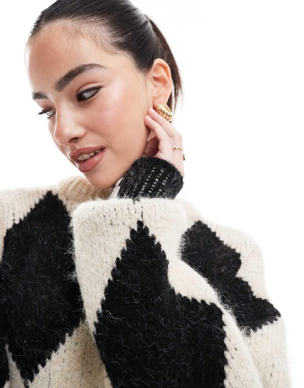 ASOS DESIGN wool blend knitted sweater with argyle pattern in black and white Product Image
