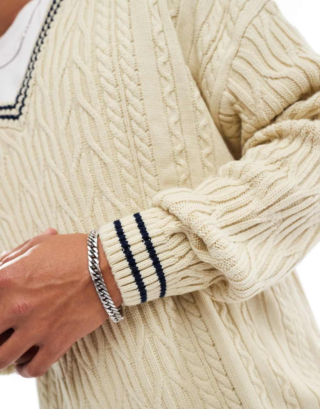 ASOS DESIGN oversized cable knit cricket sweater in cream with navy tipping Product Image