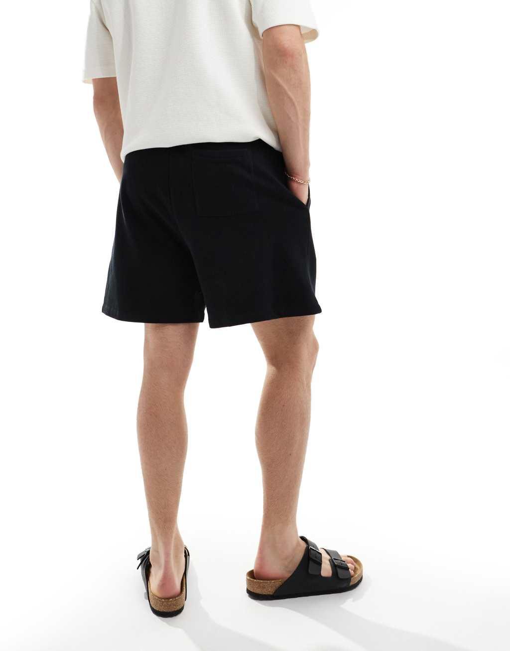 ASOS DESIGN oversized shorts in black Product Image