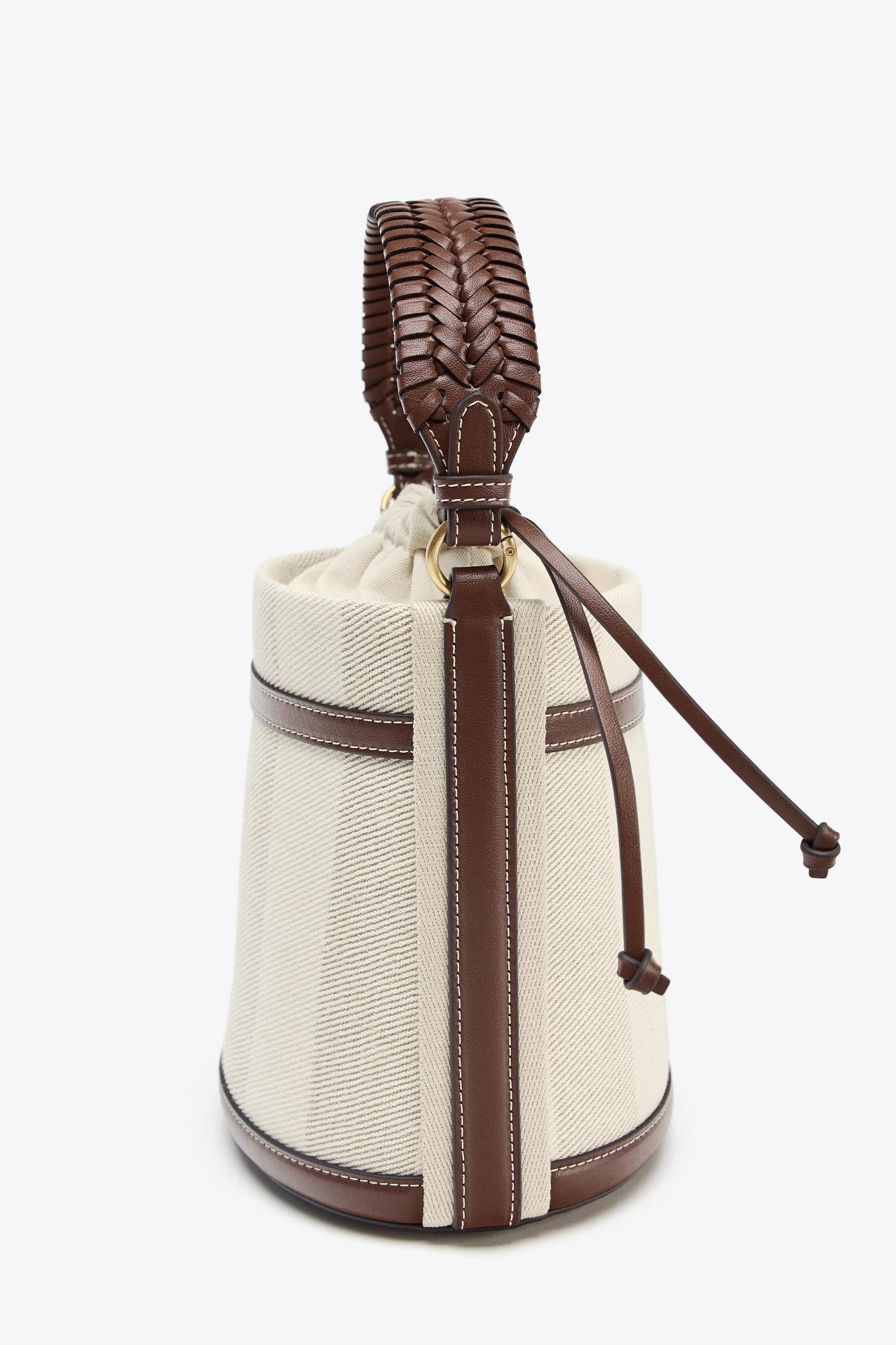 STRIPED CANVAS BUCKET BAG Product Image