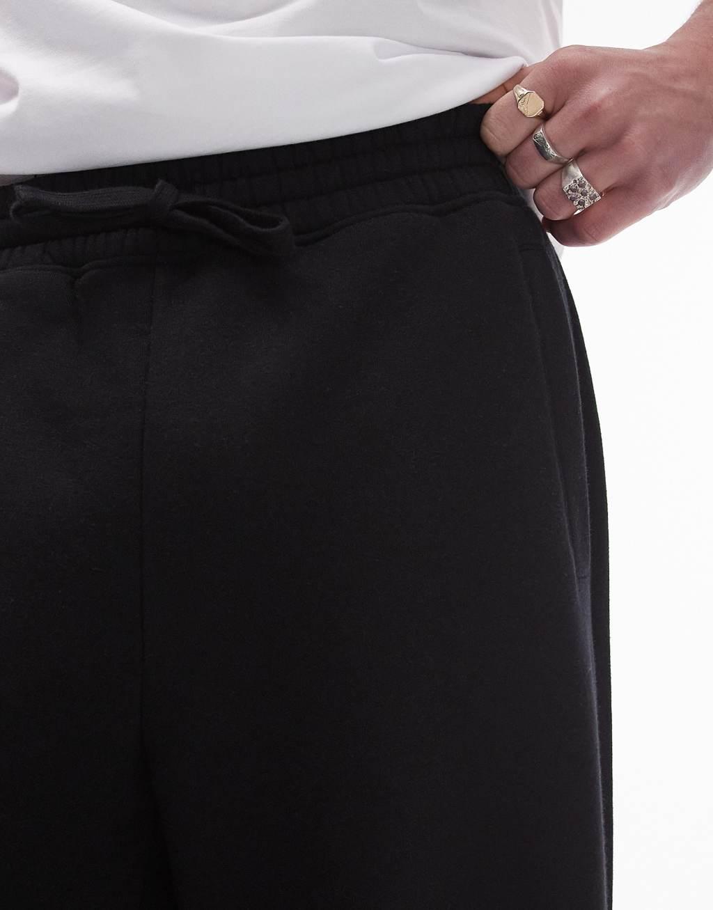 Topman baggy leg sweatpants in black Product Image