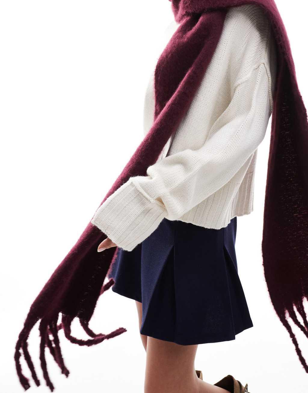 ASOS DESIGN fluffy tassel scarf in burgundy Product Image