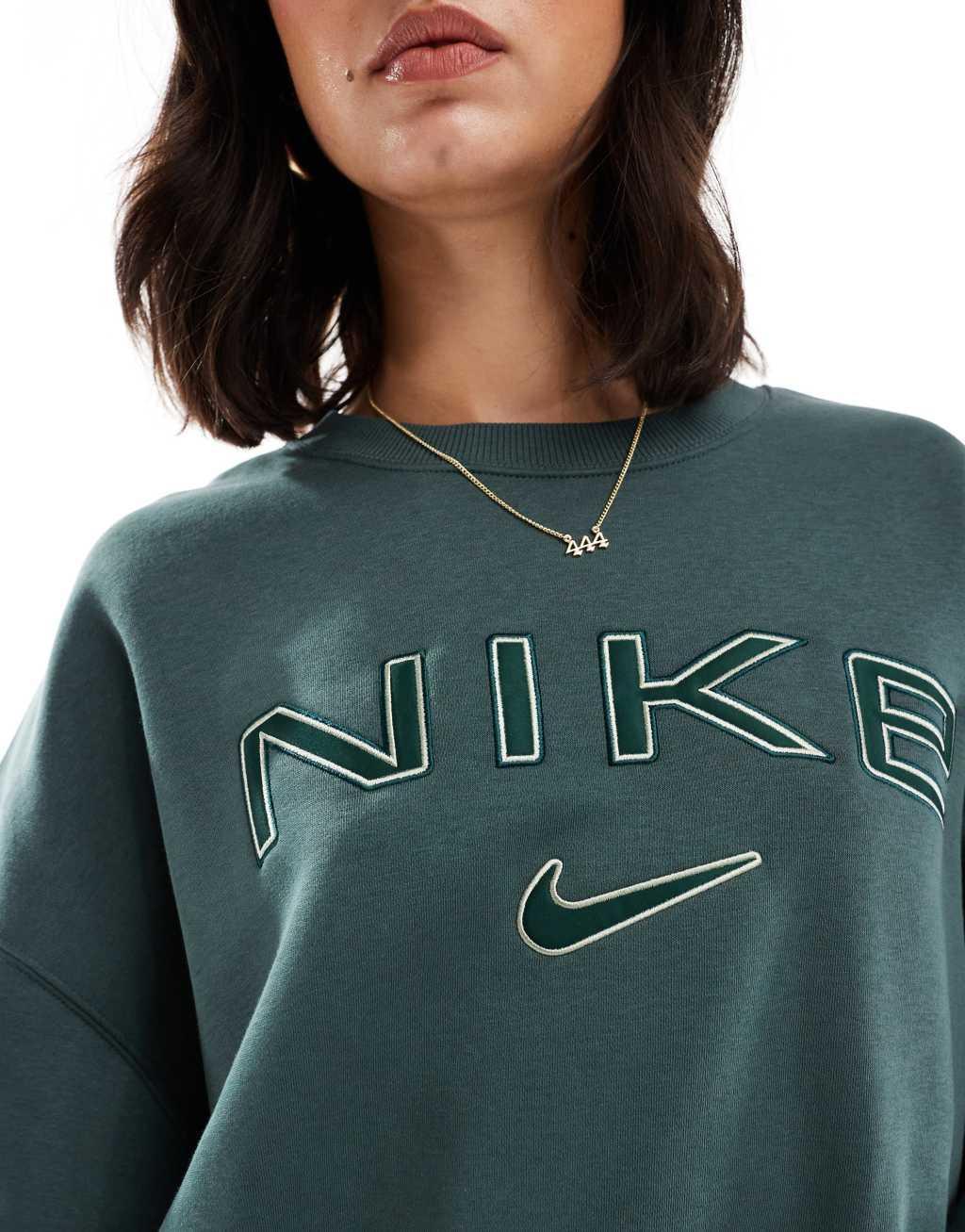 Nike Phoenix Fleece over-oversized logo sweatshirt in dark green Product Image