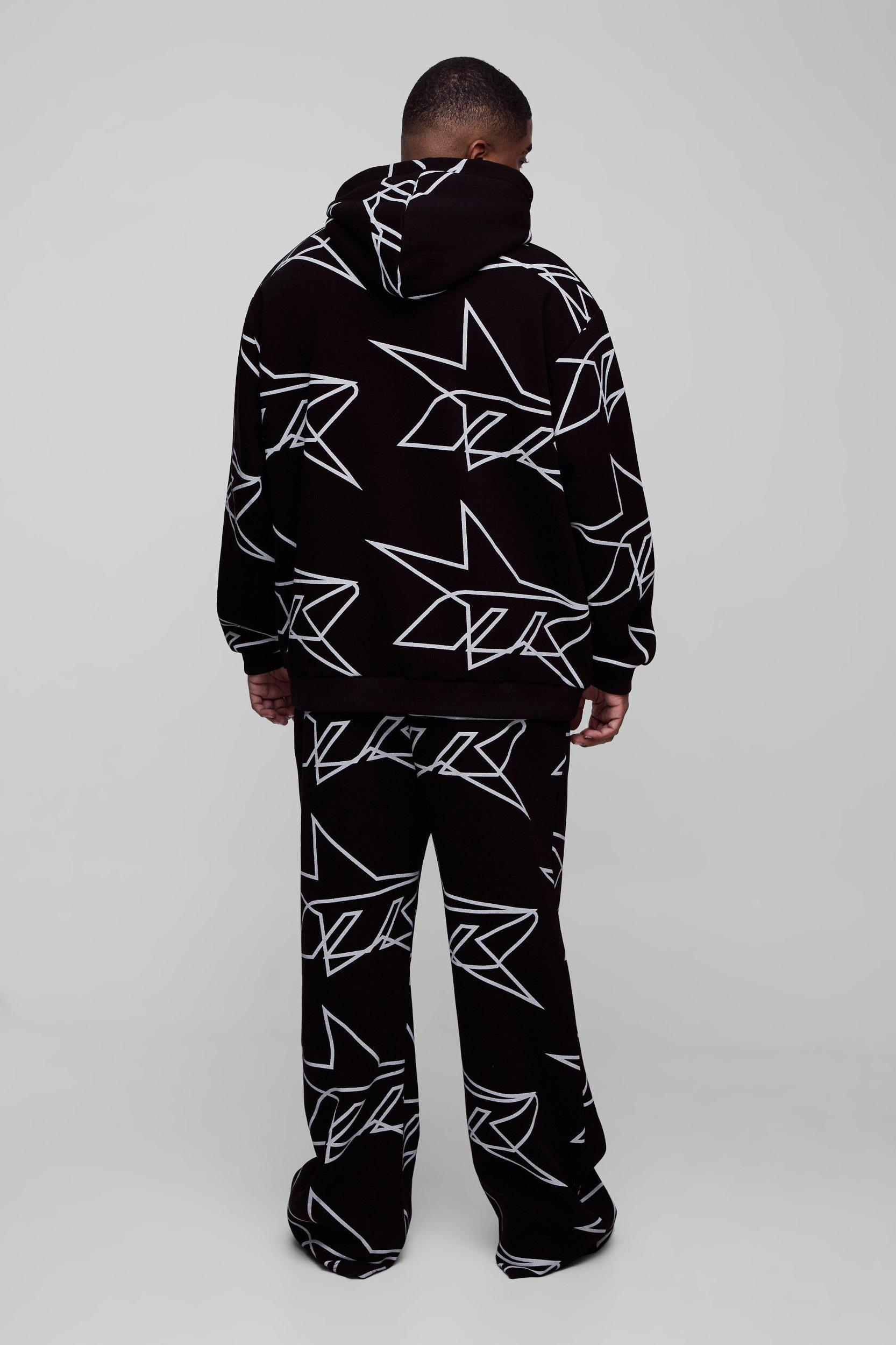 Plus Oversized Star All Over Printed Gusset Flare Hooded Tracksuit | boohooMAN USA Product Image