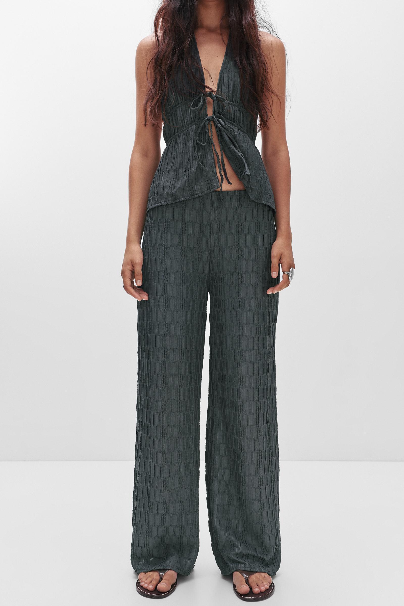 Textured bell bottom trousers Product Image