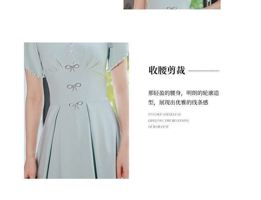 Short-Sleeve V-Neck Plain Faux Pearl Midi A-Line Cocktail Dress Product Image