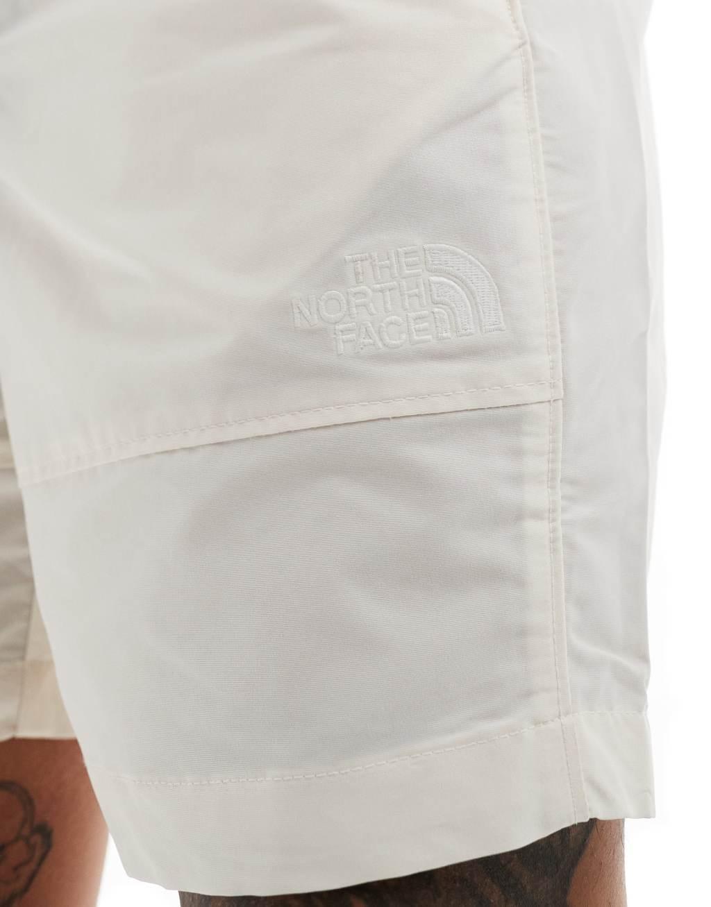 The North Face Easy Wind shorts in cream Product Image