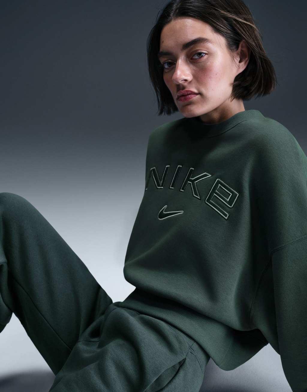 Nike Phoenix Fleece over-oversized logo sweatshirt in dark green Product Image