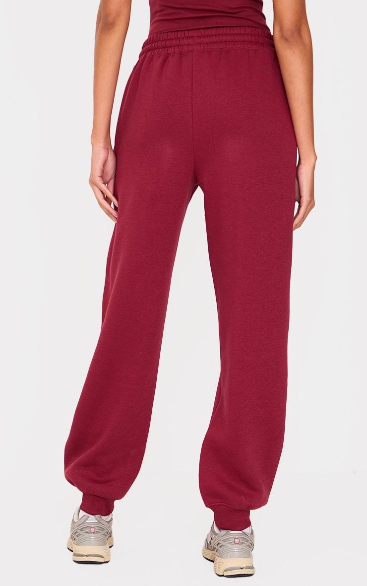 PRETTYLITTLETHING Burgundy Puff Print High Waist Cuffed Sweatpants Product Image