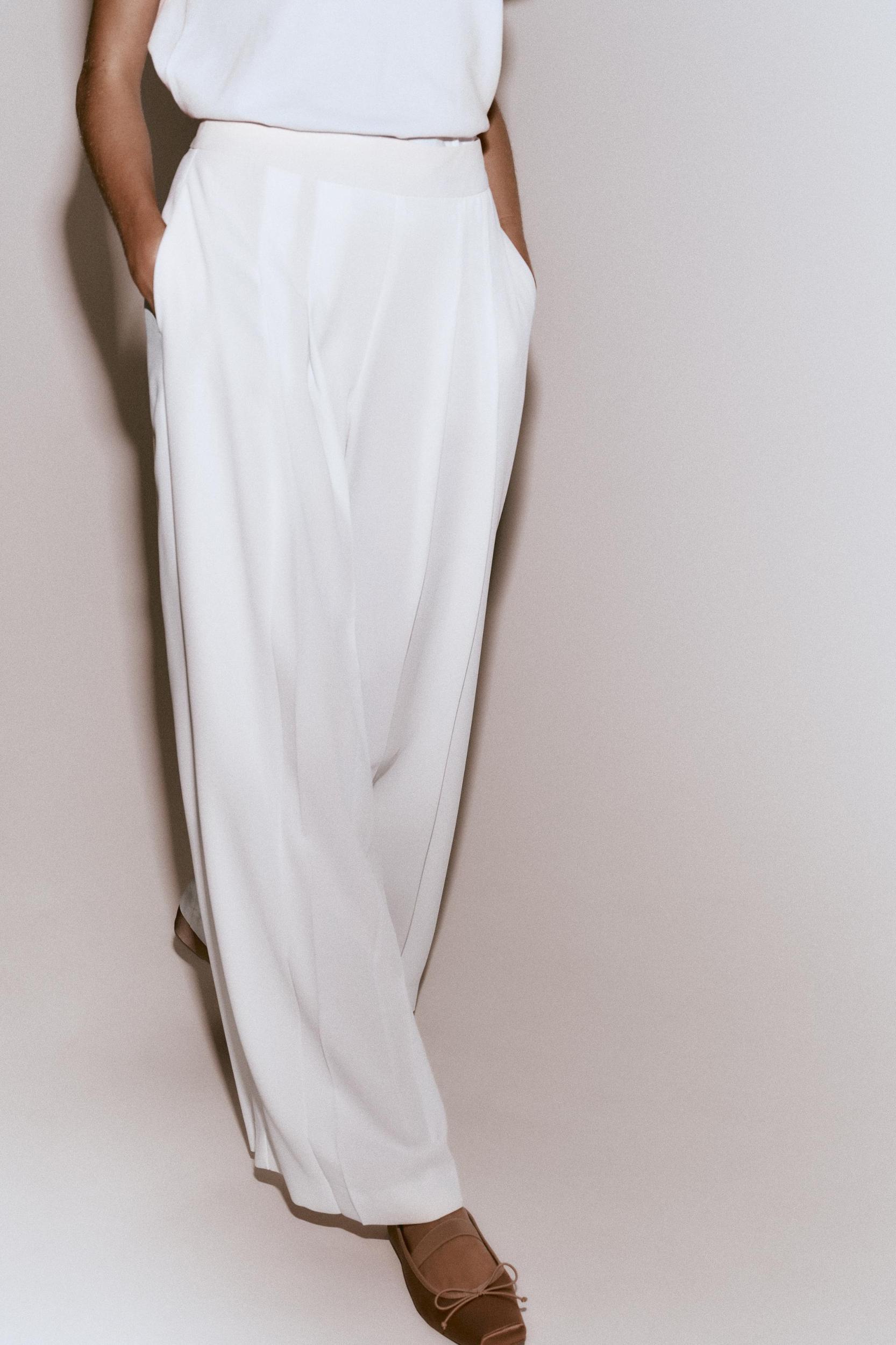 PLEATED PALAZZO PANTS Product Image