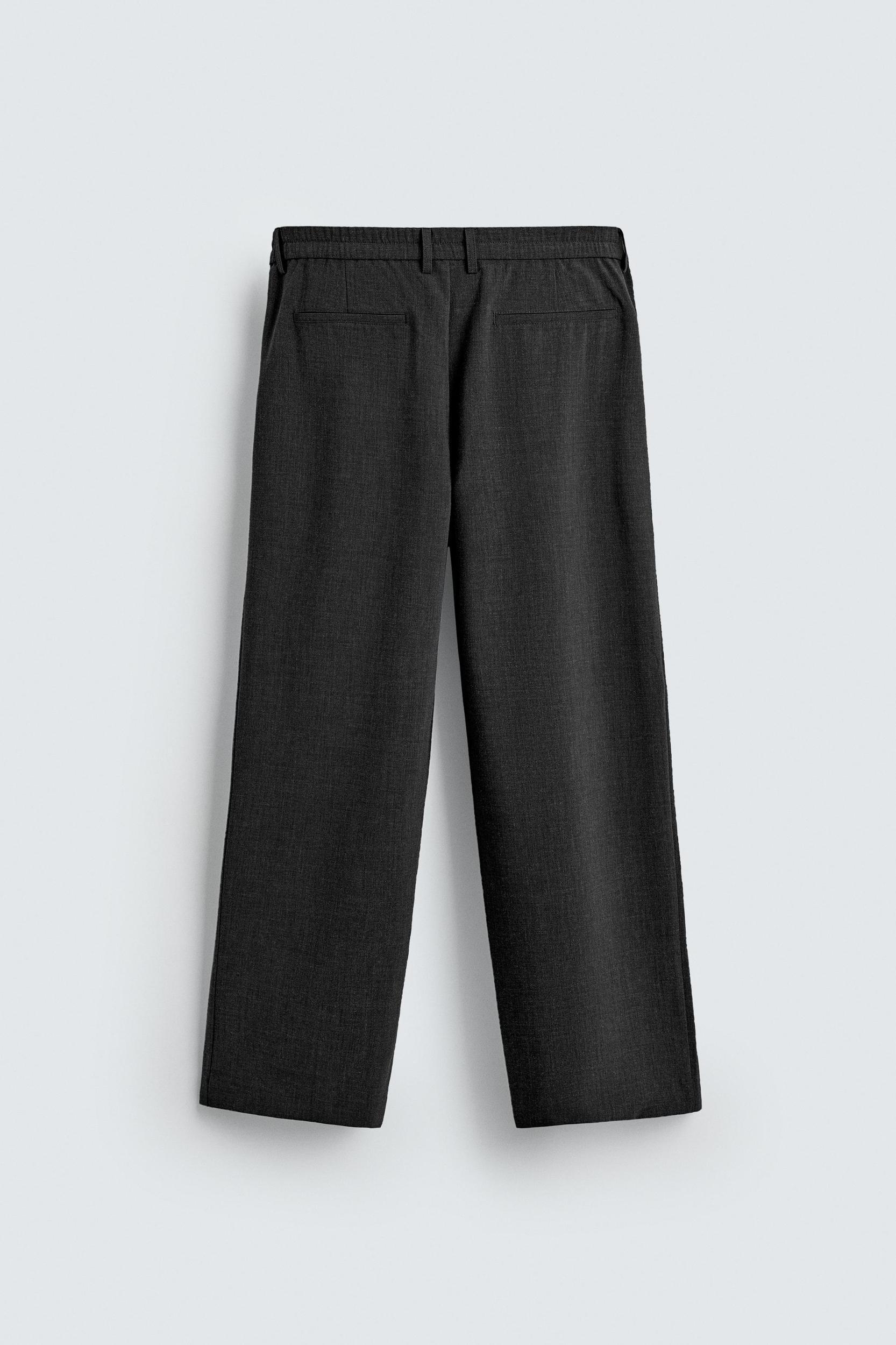 PLEATED WIDE FIT PANTS Product Image