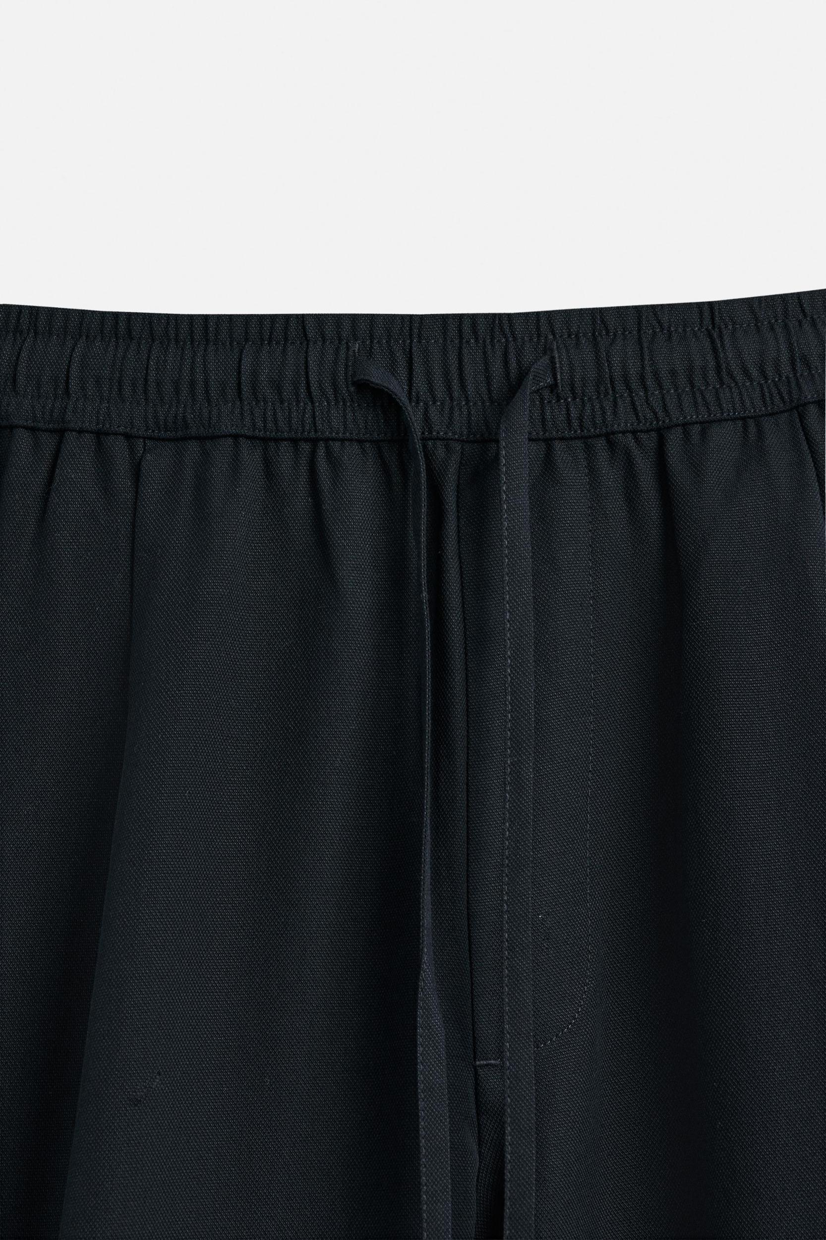 RELAXED FIT LYOCELL PANTS Product Image