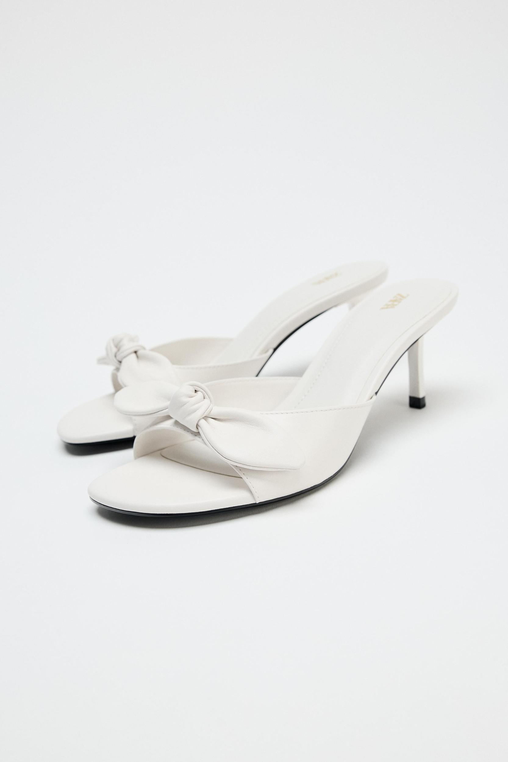 LEATHER BOW HEELED SANDALS Product Image