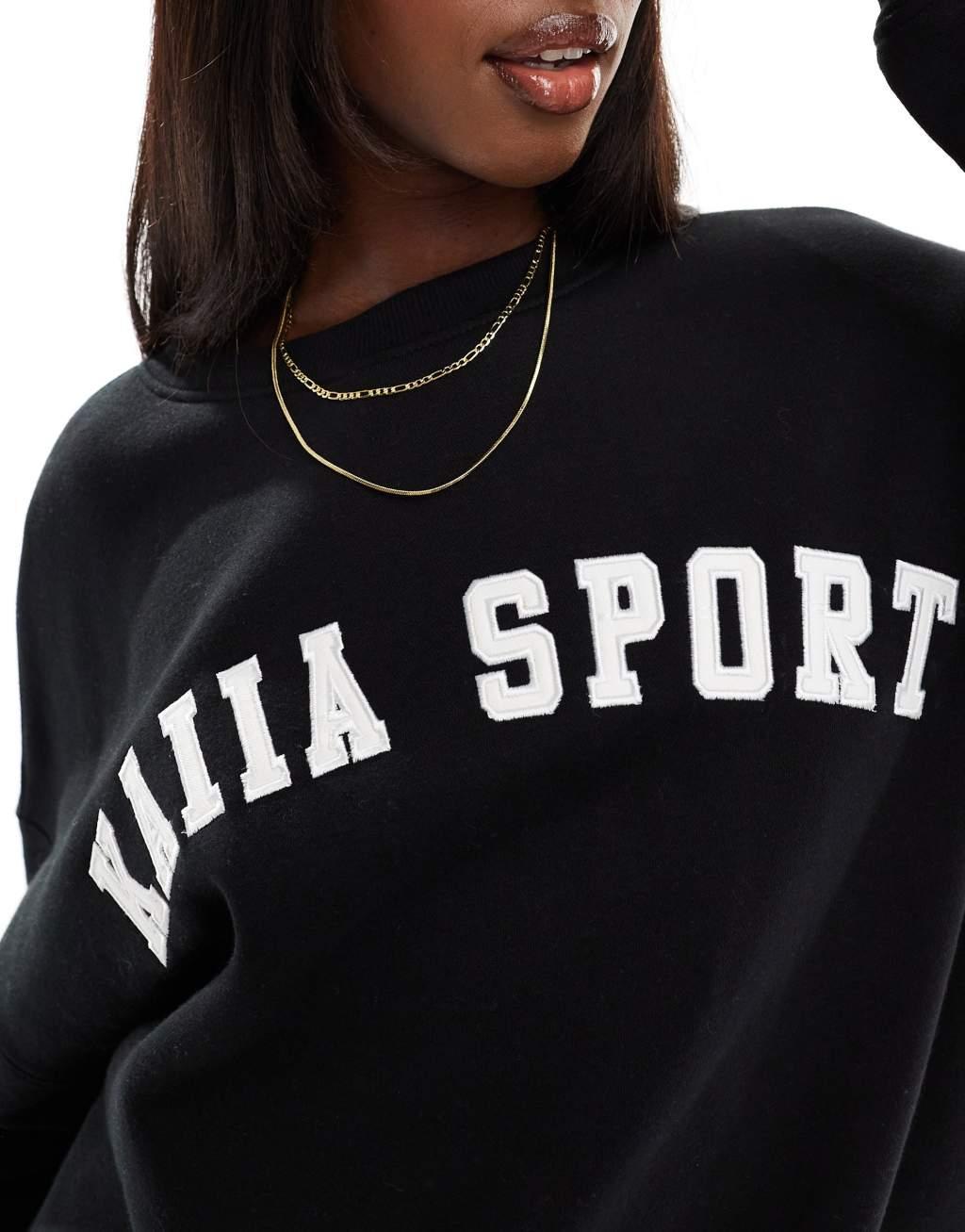 Kaiia sport logo oversized sweatshirt in black Product Image