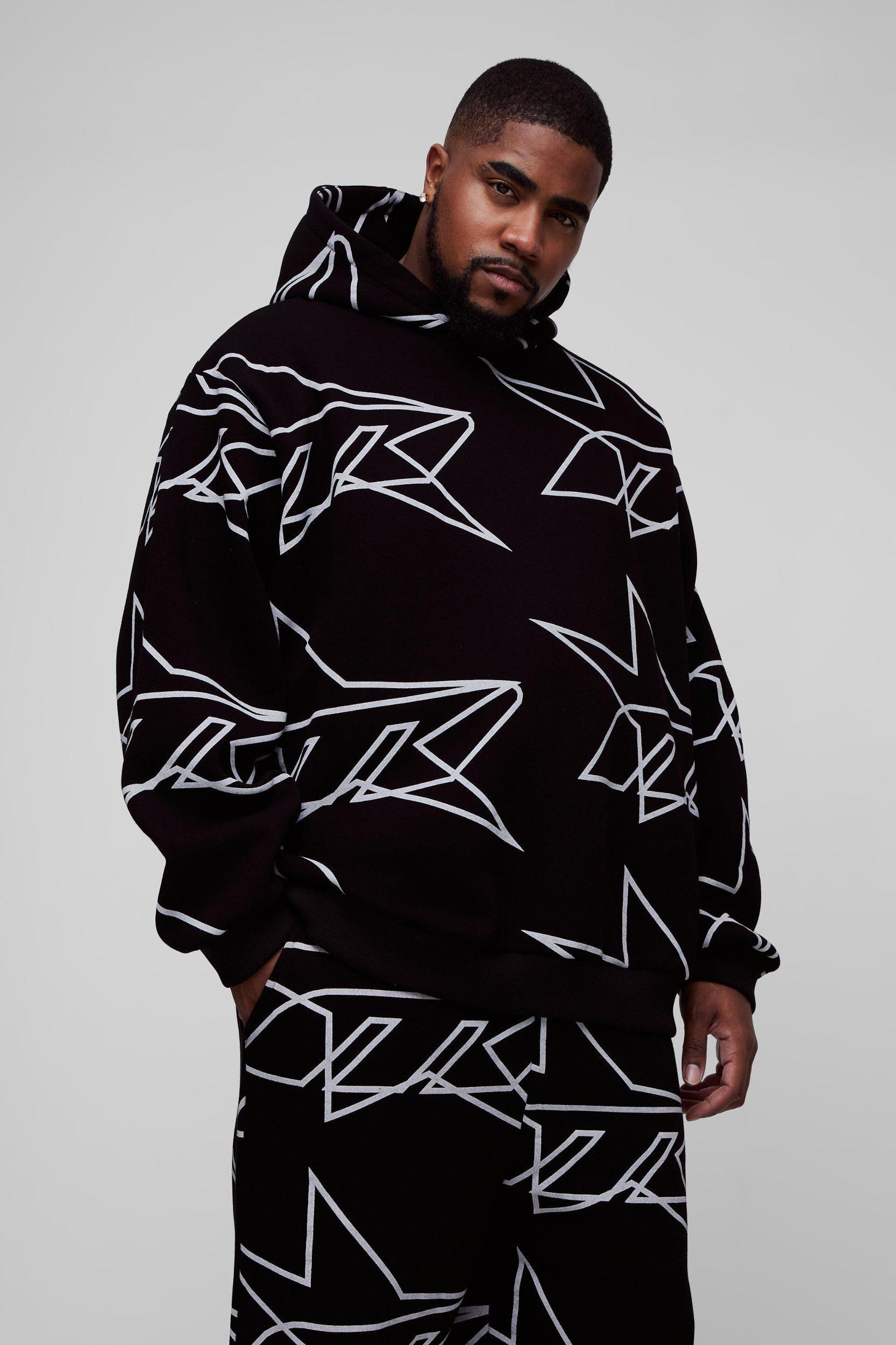 Plus Oversized Star All Over Printed Gusset Flare Hooded Tracksuit | boohooMAN USA Product Image