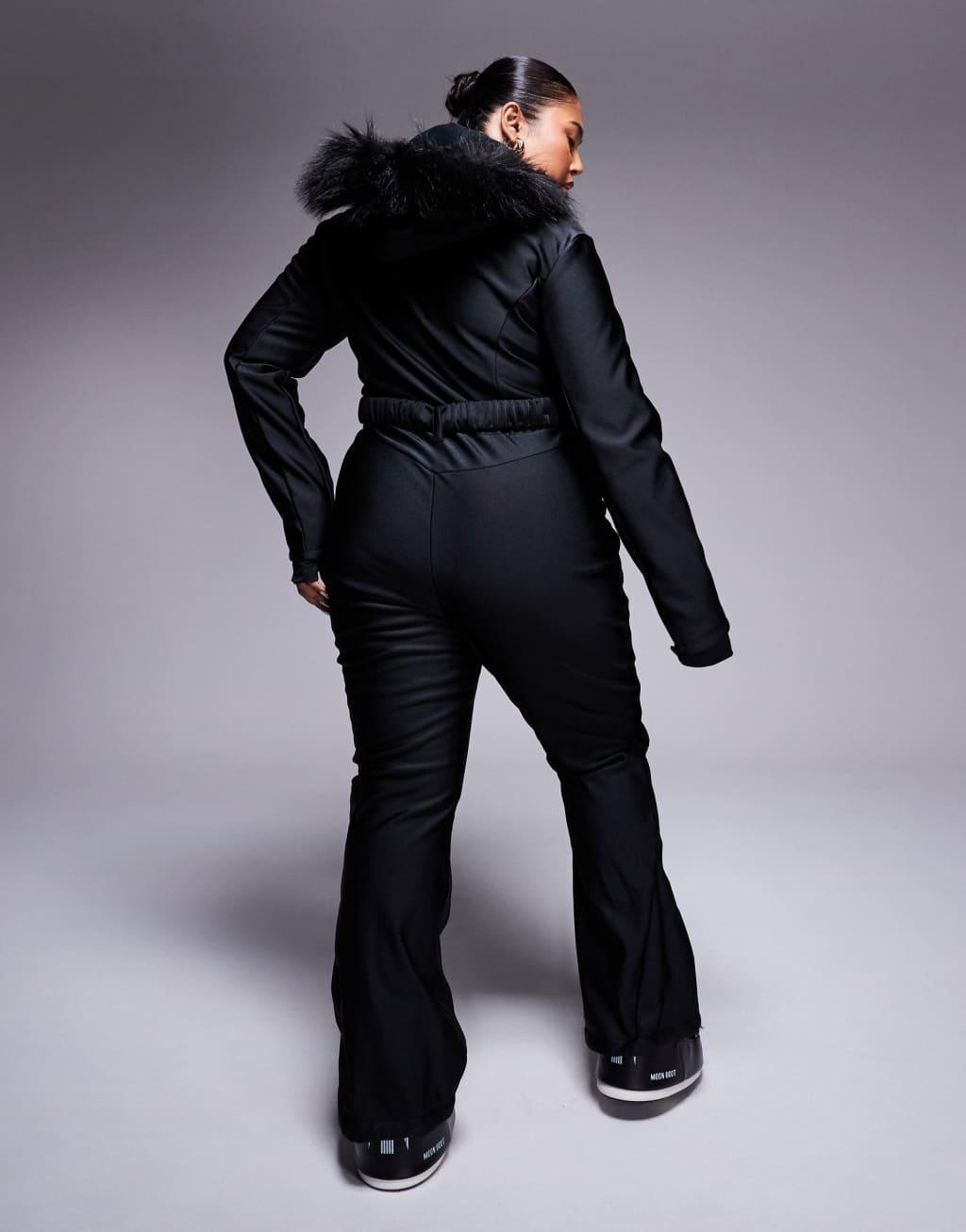 ASOS 4505 Curve belted ski suit with slim kick leg and faux fur hood in black gloss Product Image