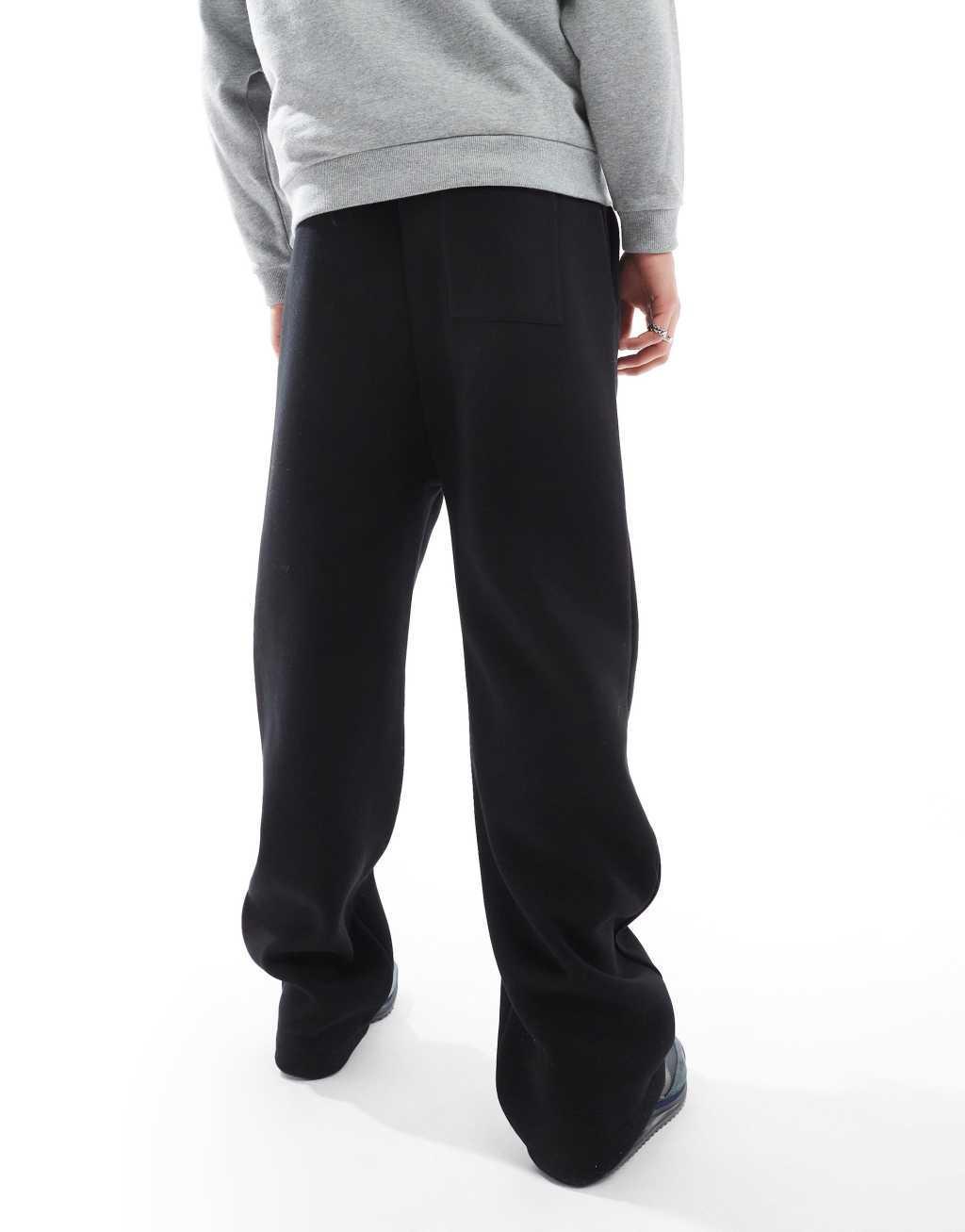 ASOS DESIGN oversized balloon sweatpants with pleat in black Product Image