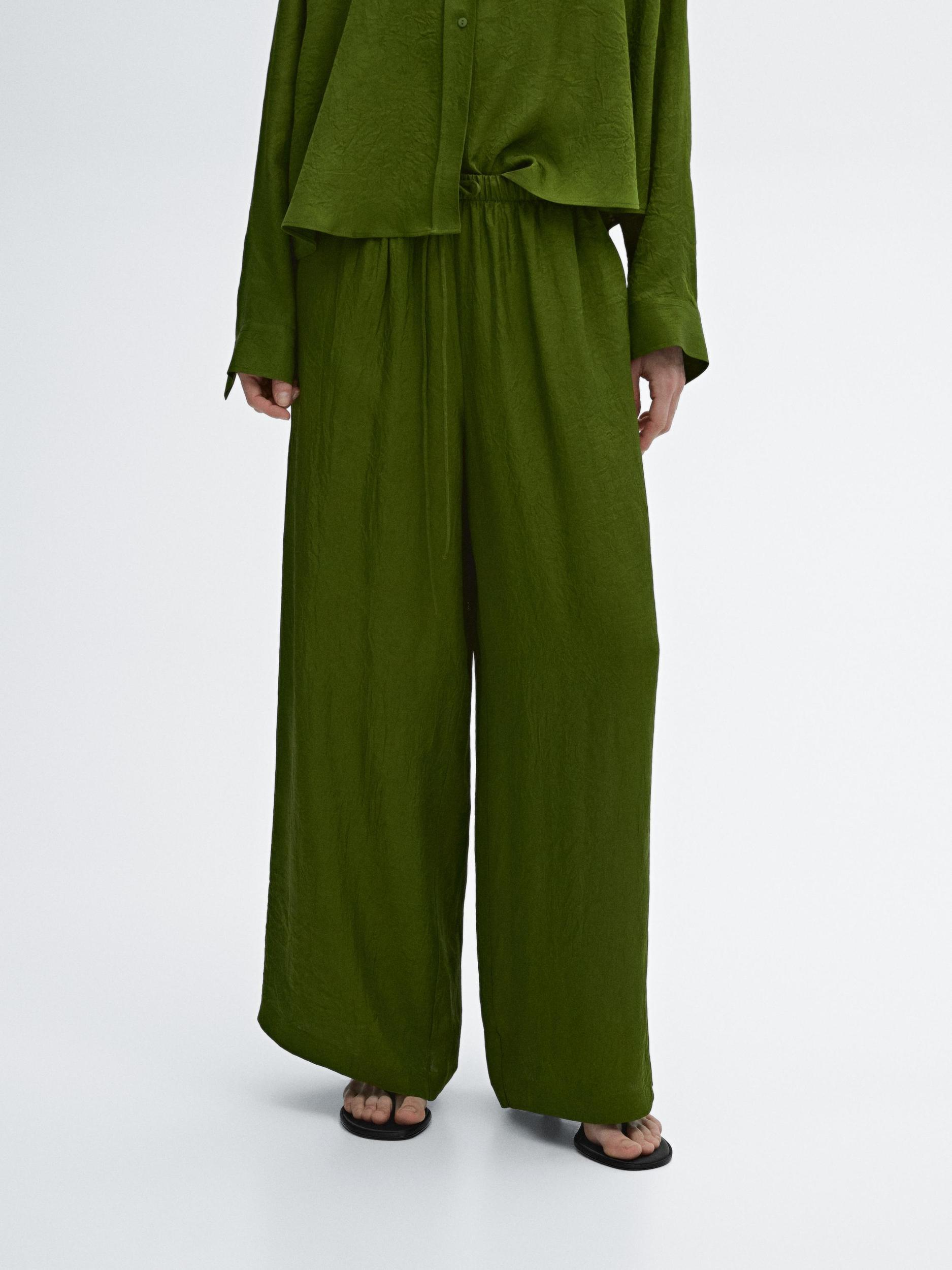 Flowing satin trousers with elastic waistband Product Image