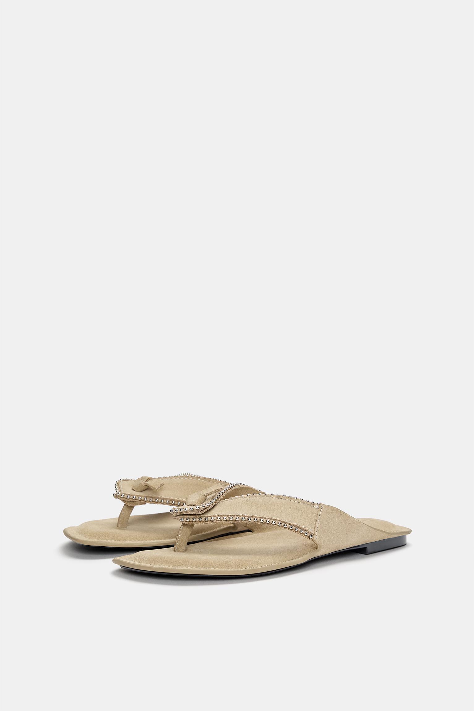 Flat sandals with leather embellishments Product Image