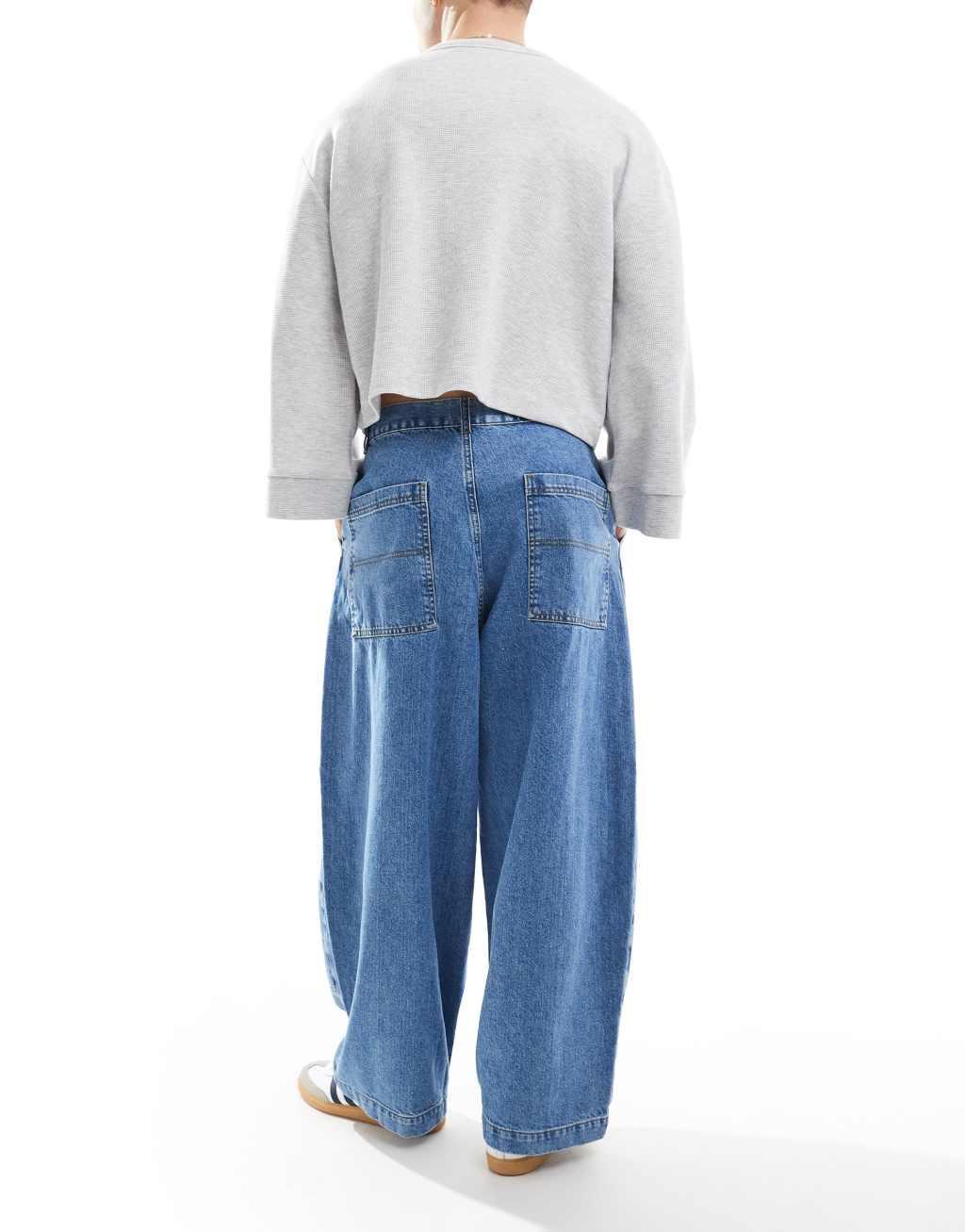 ASOS DESIGN baggy balloon jeans in mid wash blue Product Image