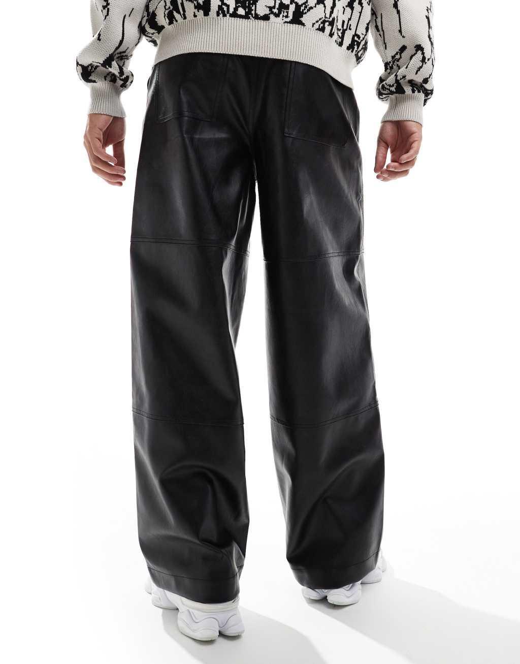 ASOS DESIGN leather look super baggy paneled leg pants in black Product Image