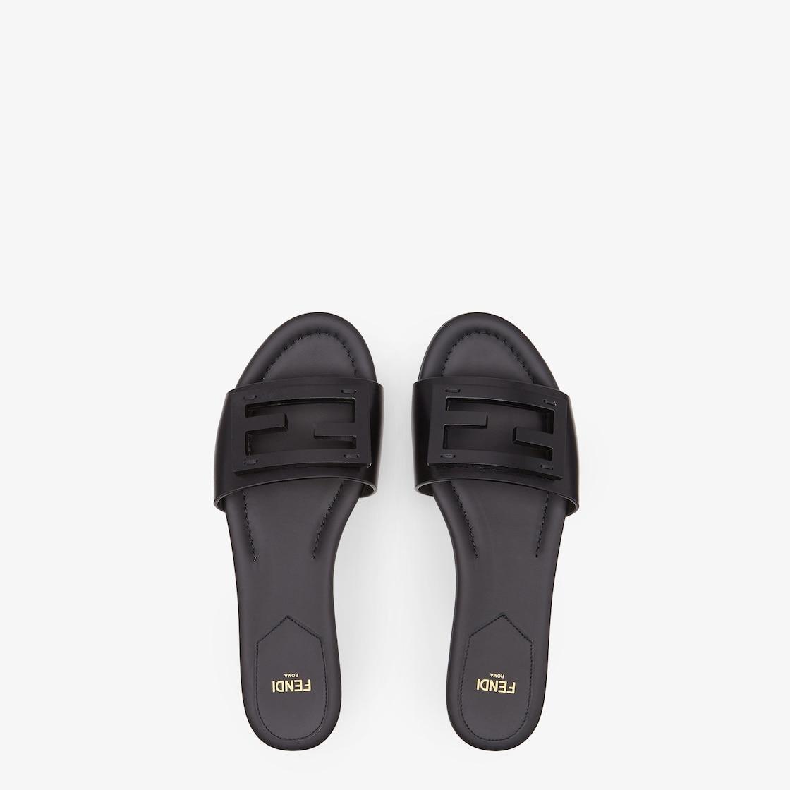 BaguetteBlack leather slides Product Image