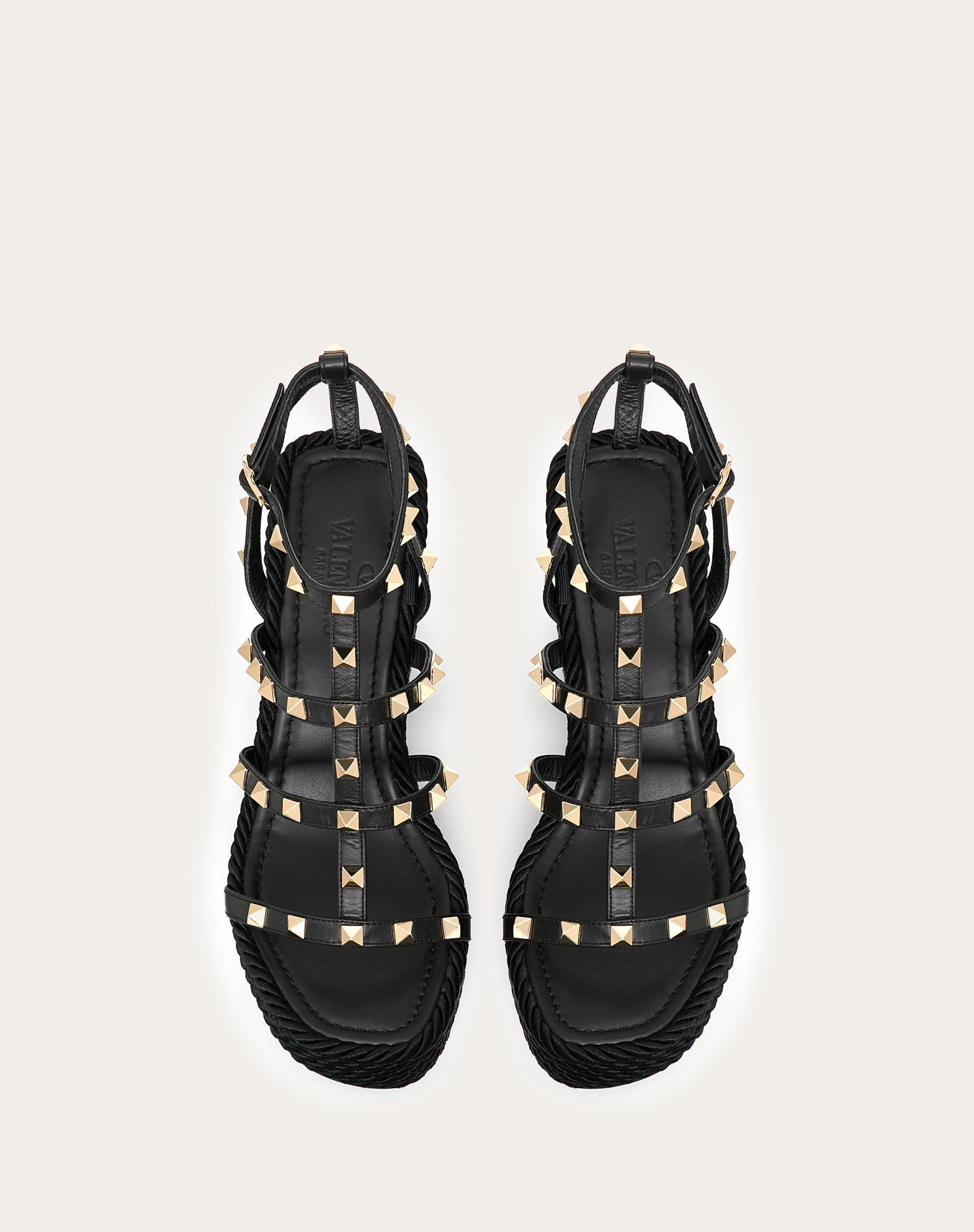 ROCKSTUD ANKLE STRAP WEDGE SANDAL IN CALFSKIN LEATHER 95 MM Product Image