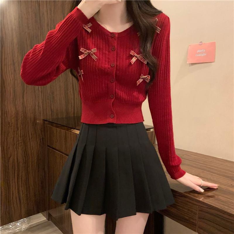 Long-Sleeve Crew Neck Bow Ribbed Button Knit Top Product Image