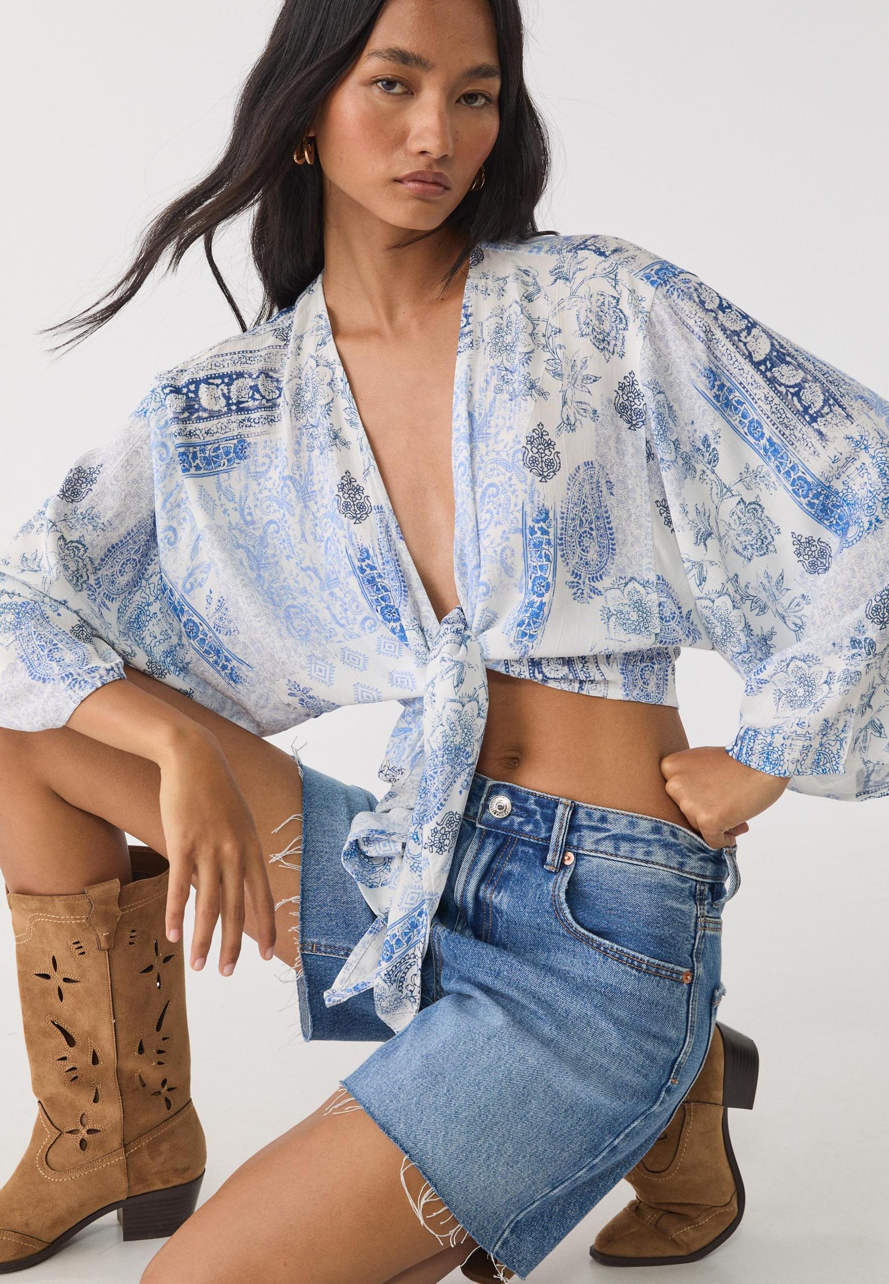 Flowing blouse with knot detail Product Image