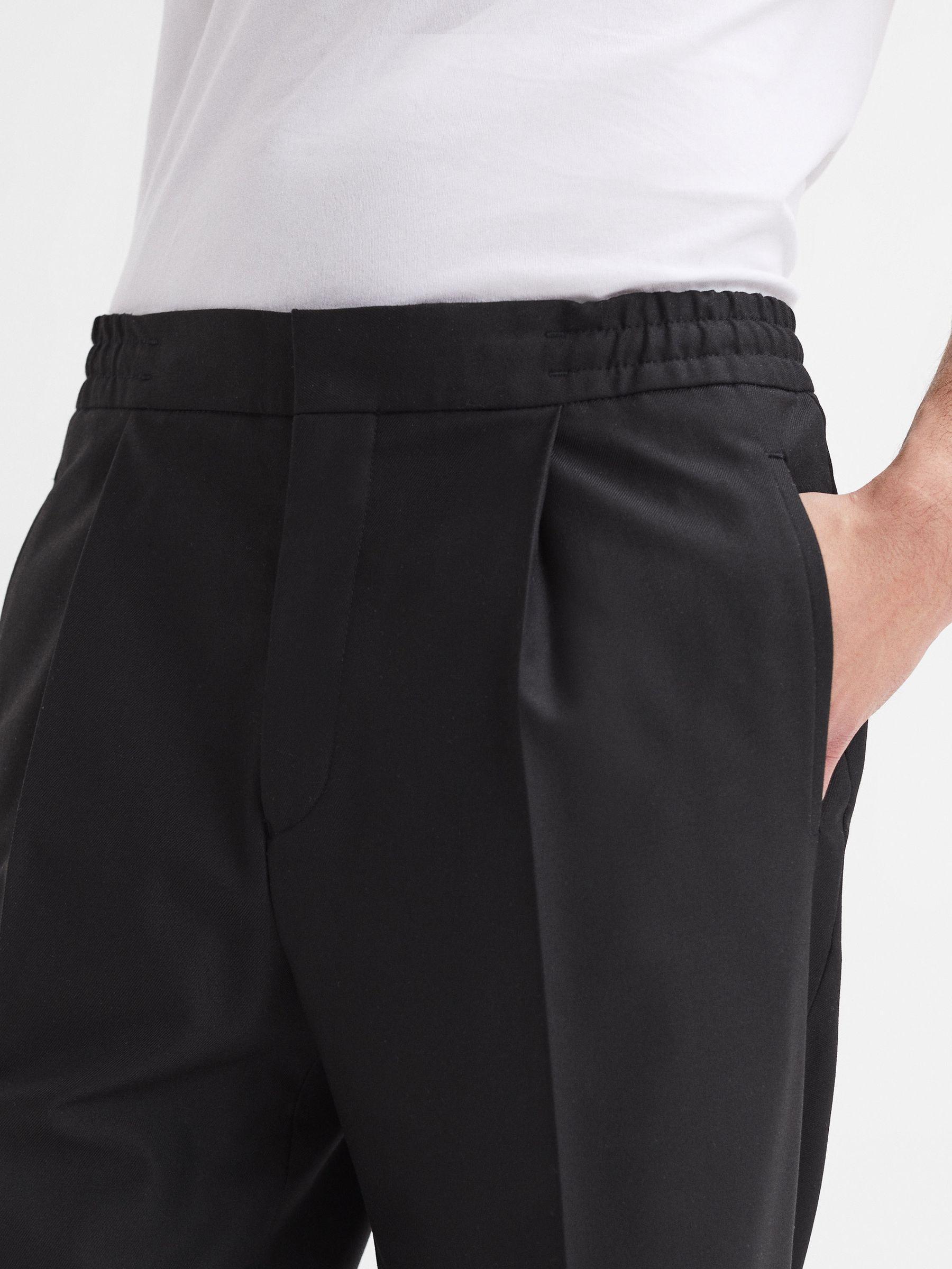 Relaxed Drawstring Trousers with Turn-Ups in Black Product Image