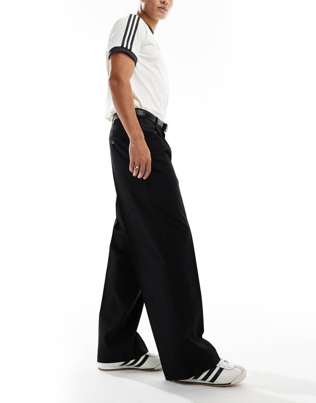 Weekday Uno loose fit tailored pants in black Product Image