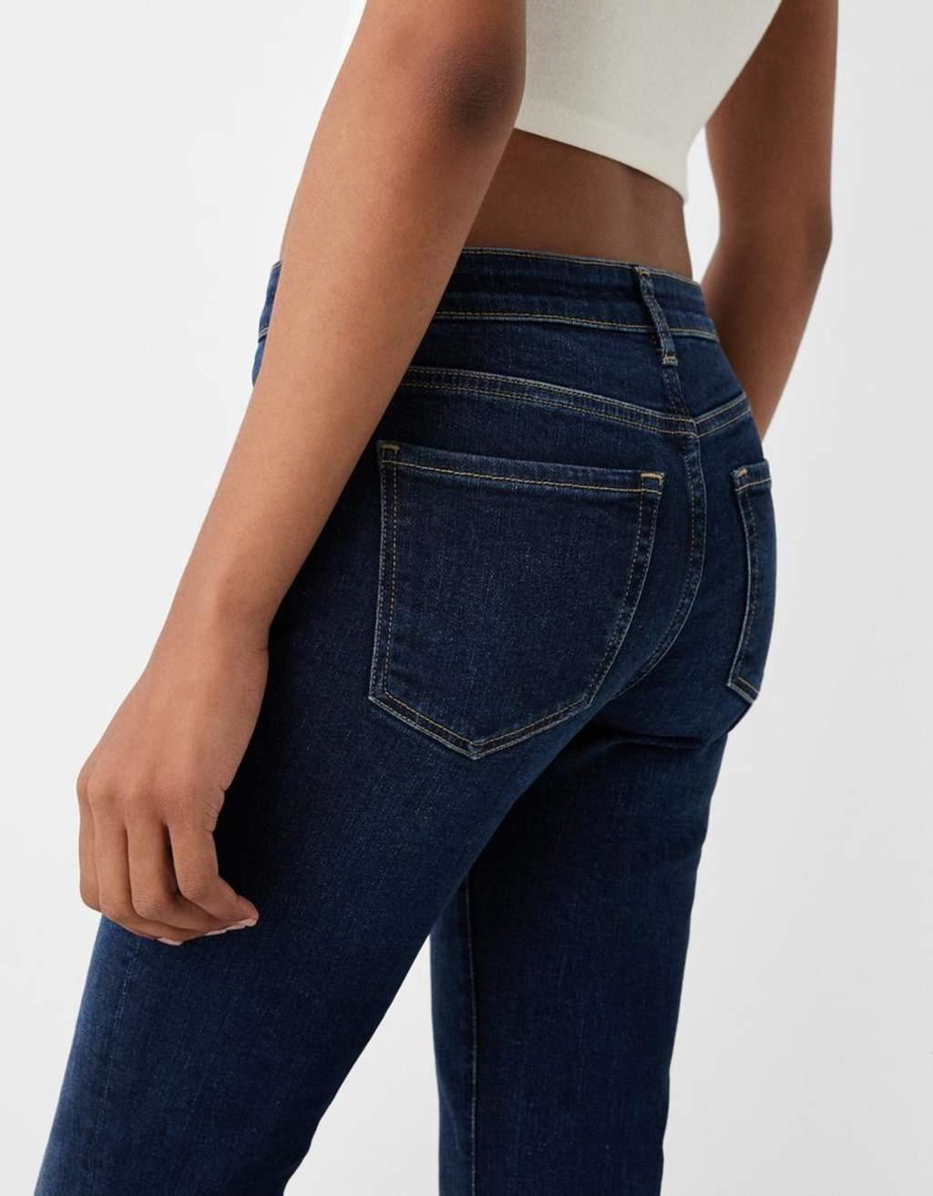 Bershka high rise flared jeans in dark wash Product Image