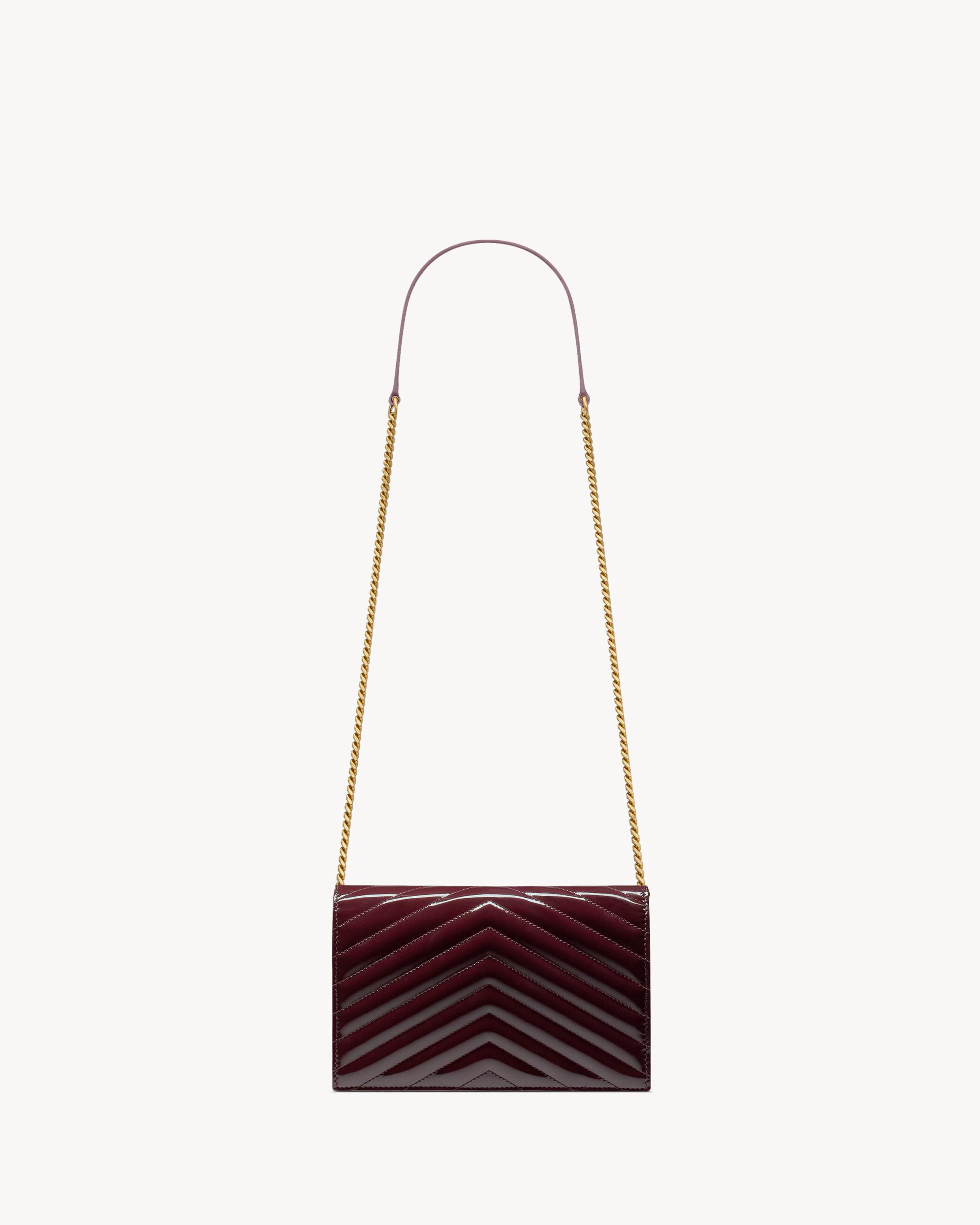 CASSANDRE envelope chain wallet in patent leather Product Image