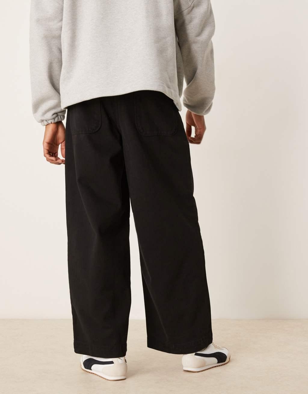 ASOS DESIGN super baggy pleated pants in black Product Image
