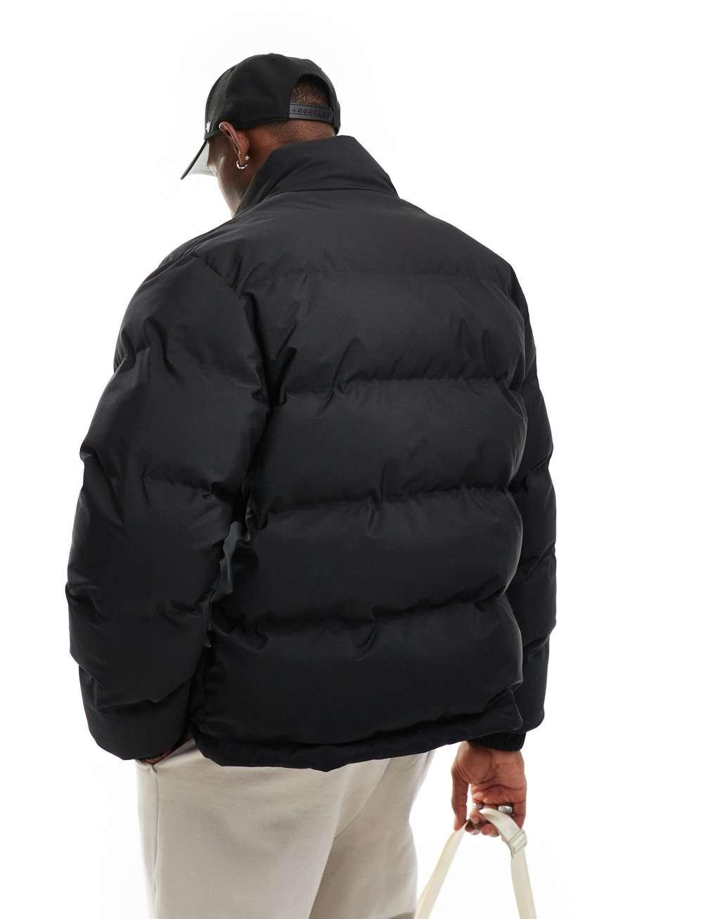 Weekday Cole puffer jacket in black Product Image