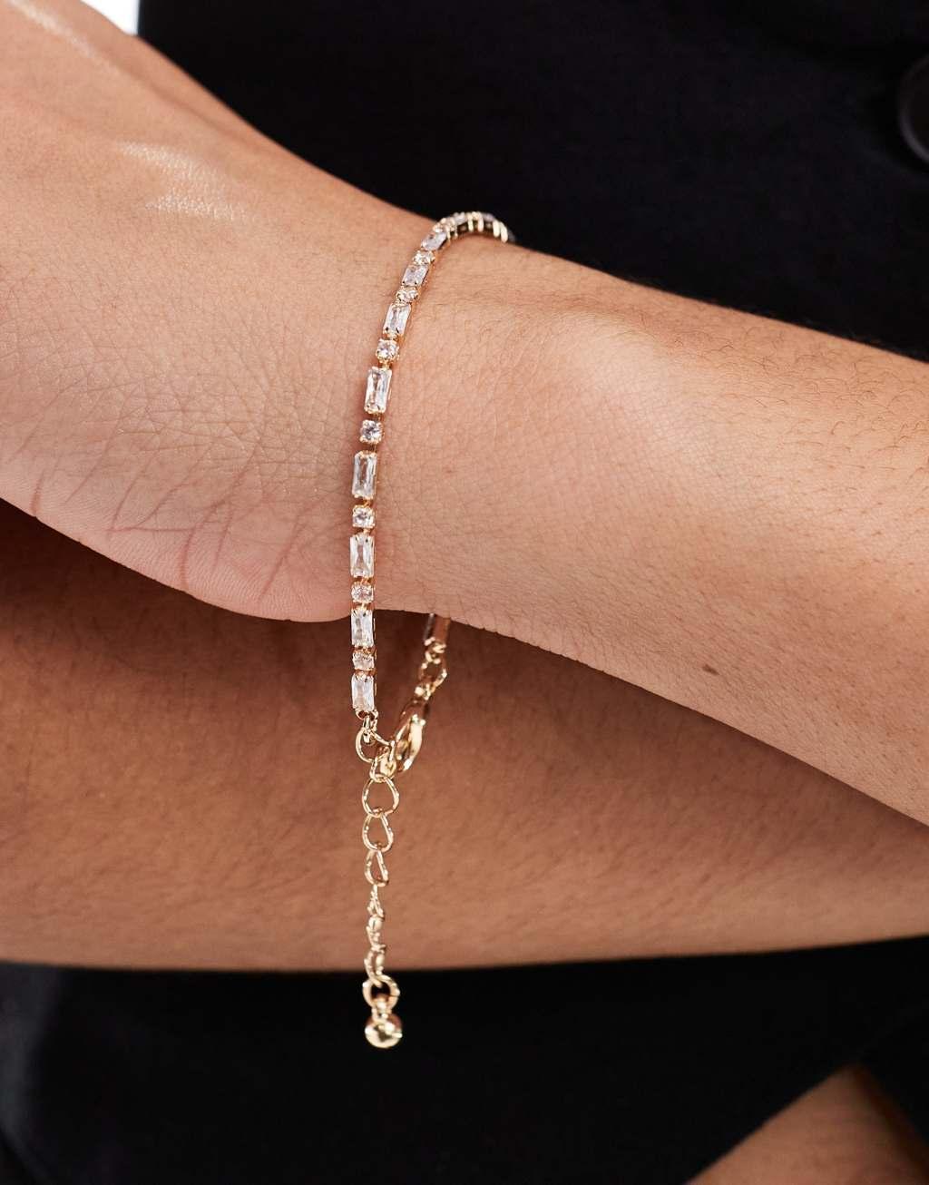 ASOS DESIGN bracelet with cubic zirconia crystals in gold tone with gift bag Product Image