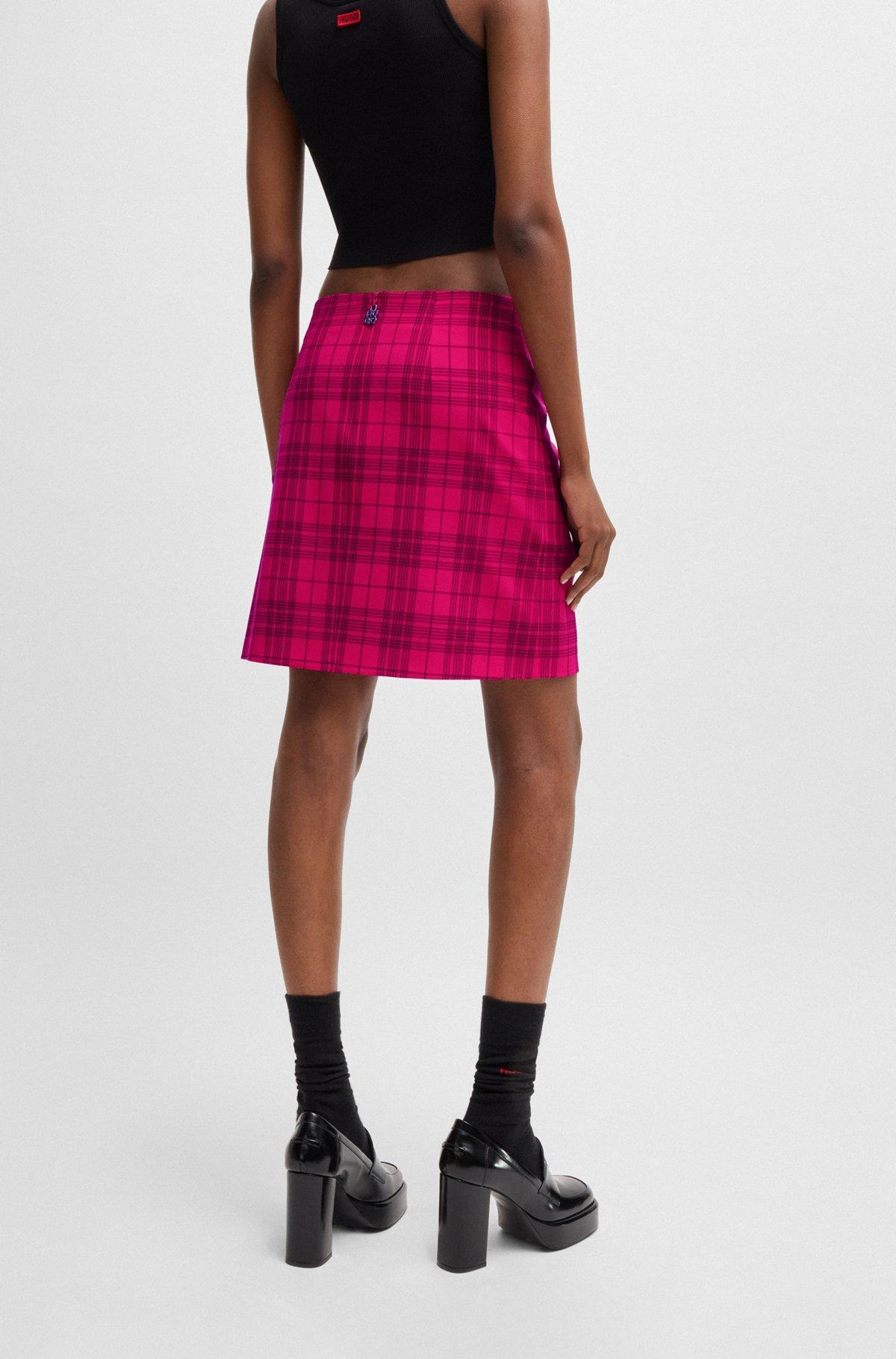 Wrap-front mini skirt in checked stretch material Product Image