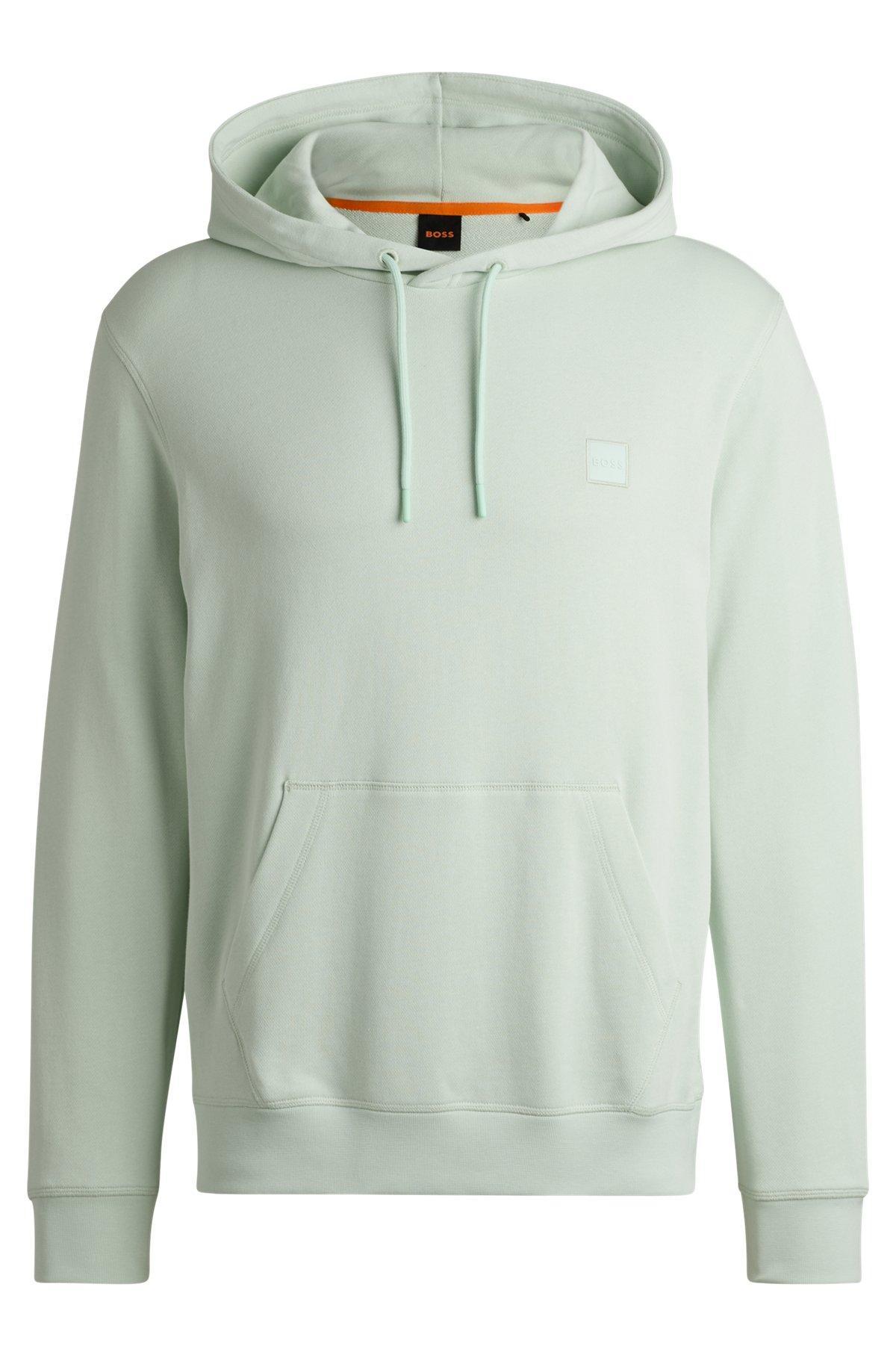 Cotton-terry hoodie with logo patch Product Image