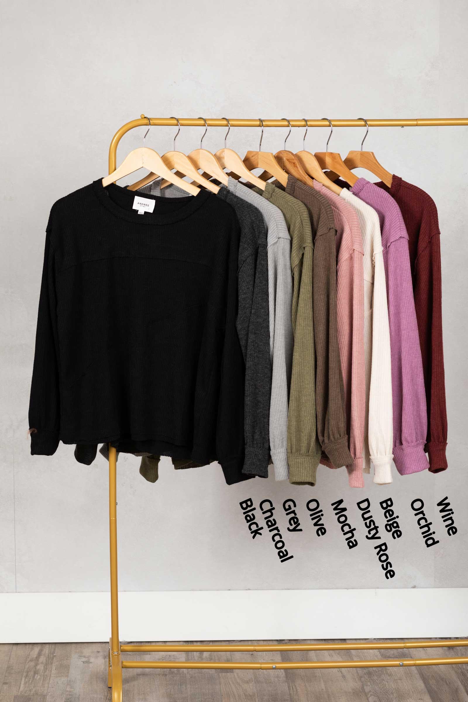 Solid Knit Top With Asymmetrical Exposed Seams Product Image