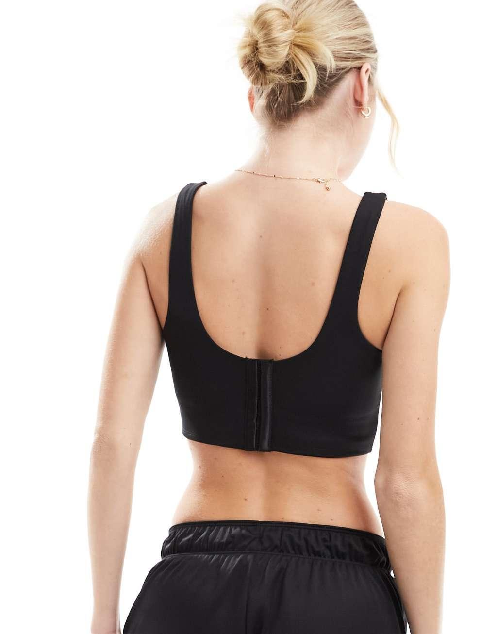 Nike swoosh corset light-support bra in black Product Image