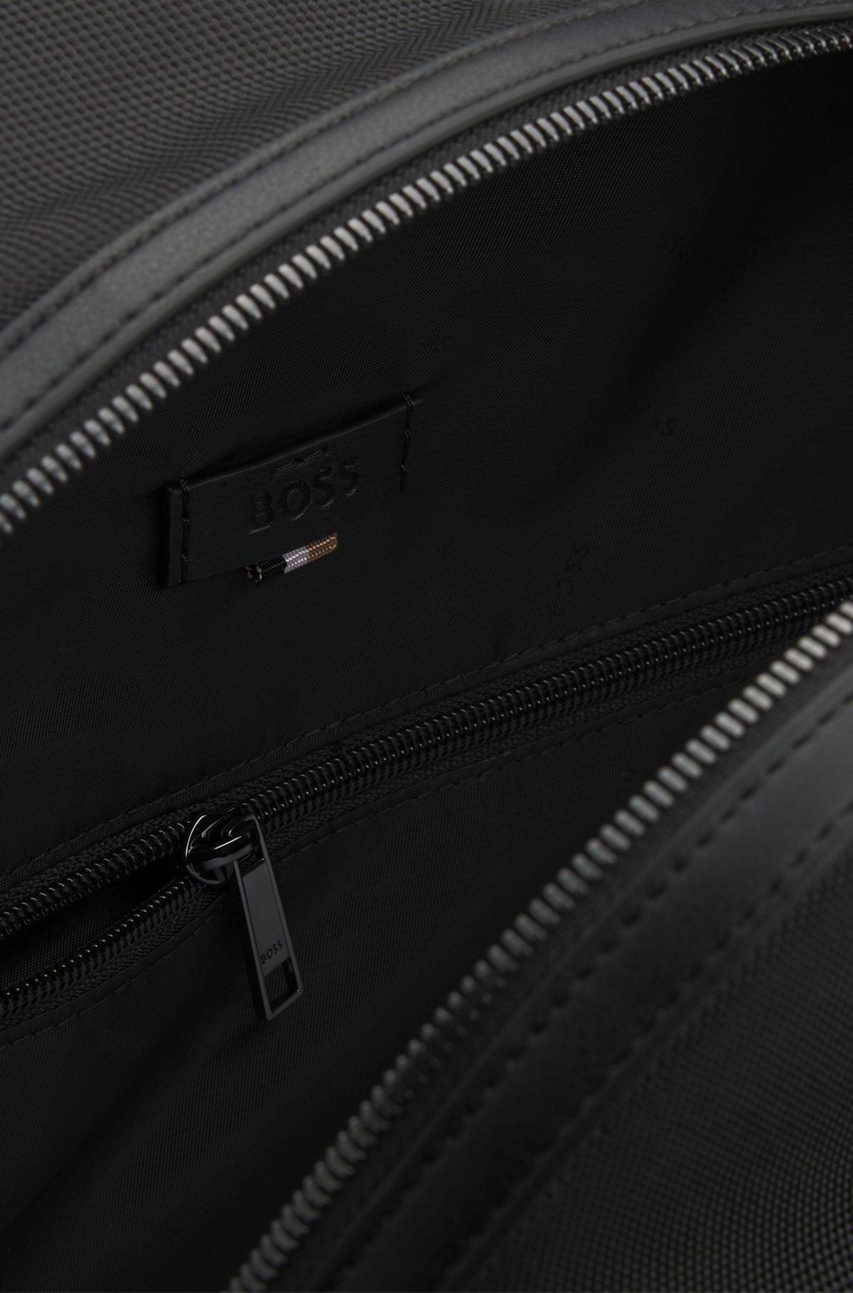 Structured backpack with signature trims Product Image