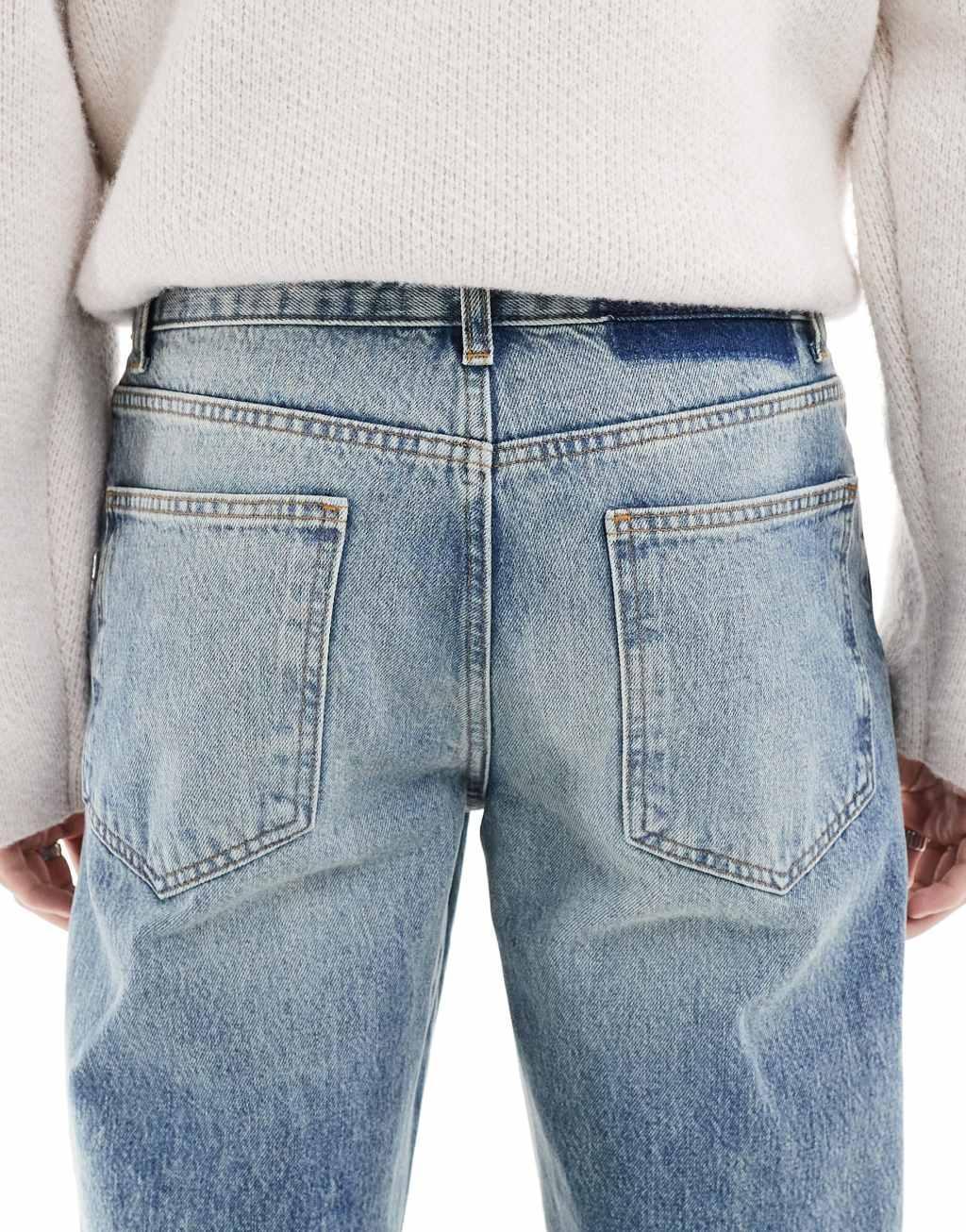 ASOS DESIGN wide flare jeans in light wash blue Product Image