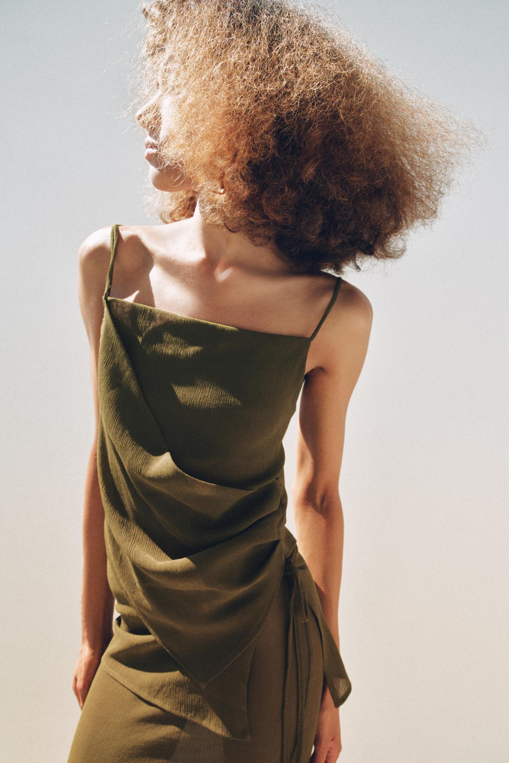 SEMI-SHEER TEXTURED ASYMMETRIC TOP Product Image