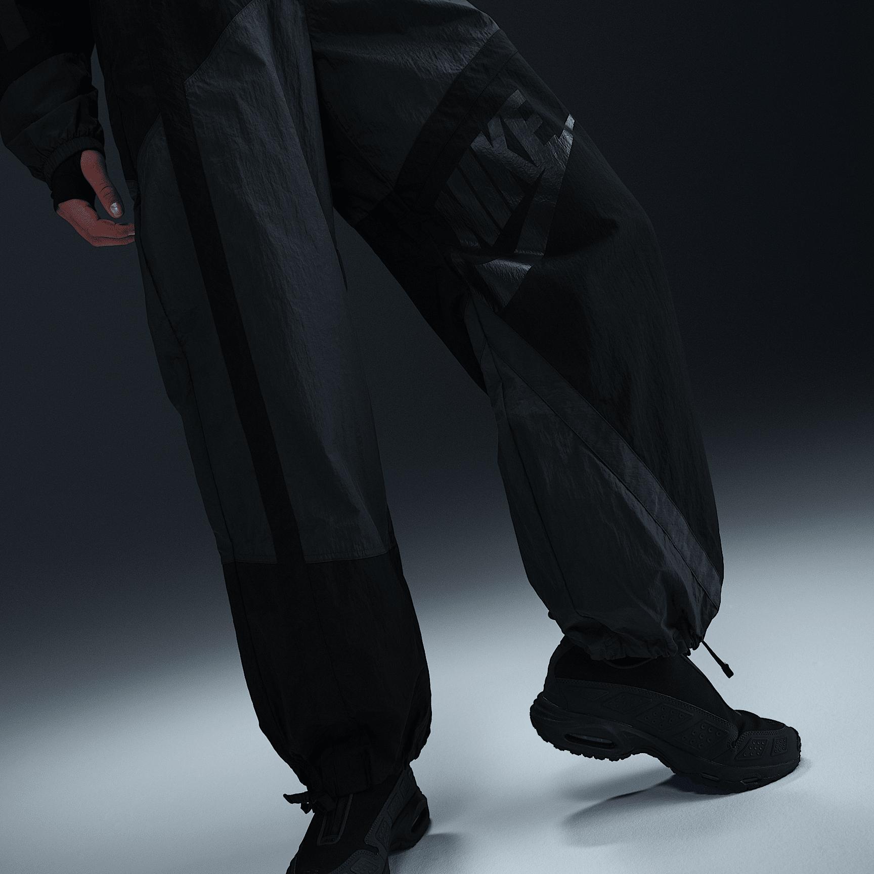 Nike Sportswear Women's Mid-Rise Loose Woven Open-Hem Pants Product Image