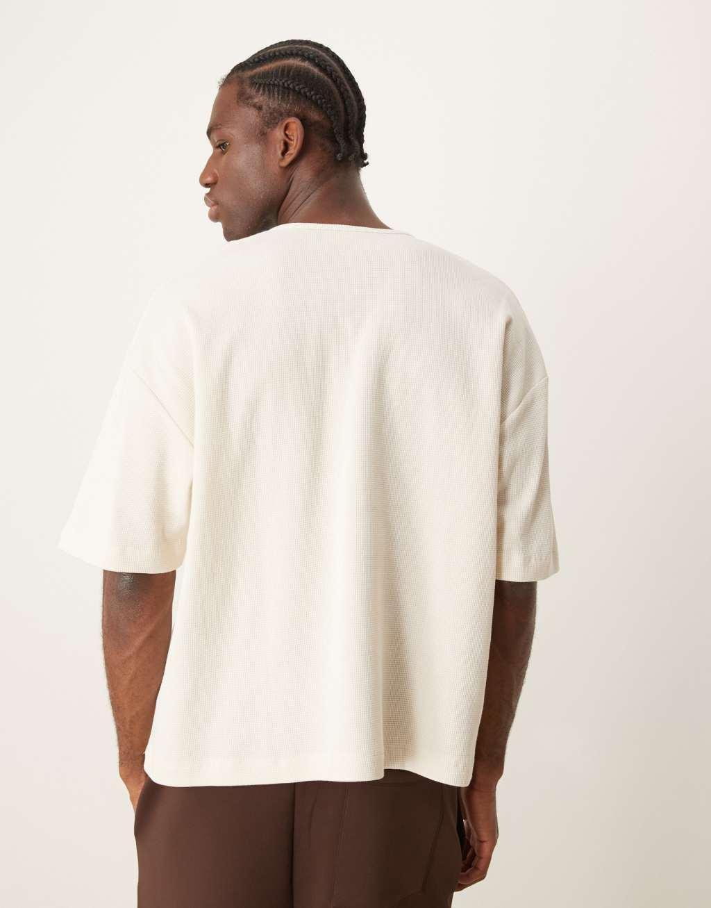 ASOS DESIGN oversized boxy waffle t-shirt with notch neck in cream Product Image