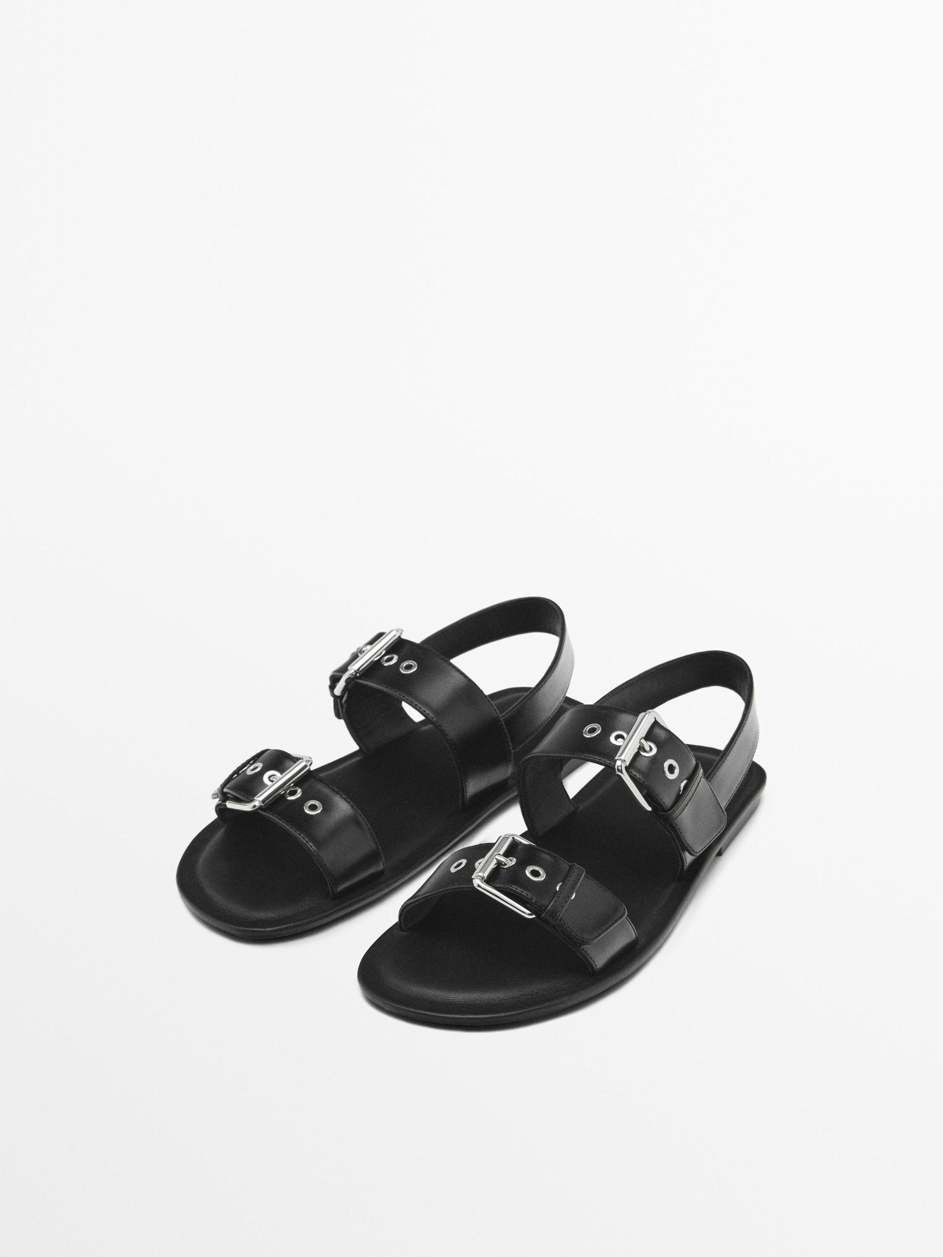 Flat slider sandals with buckles Product Image