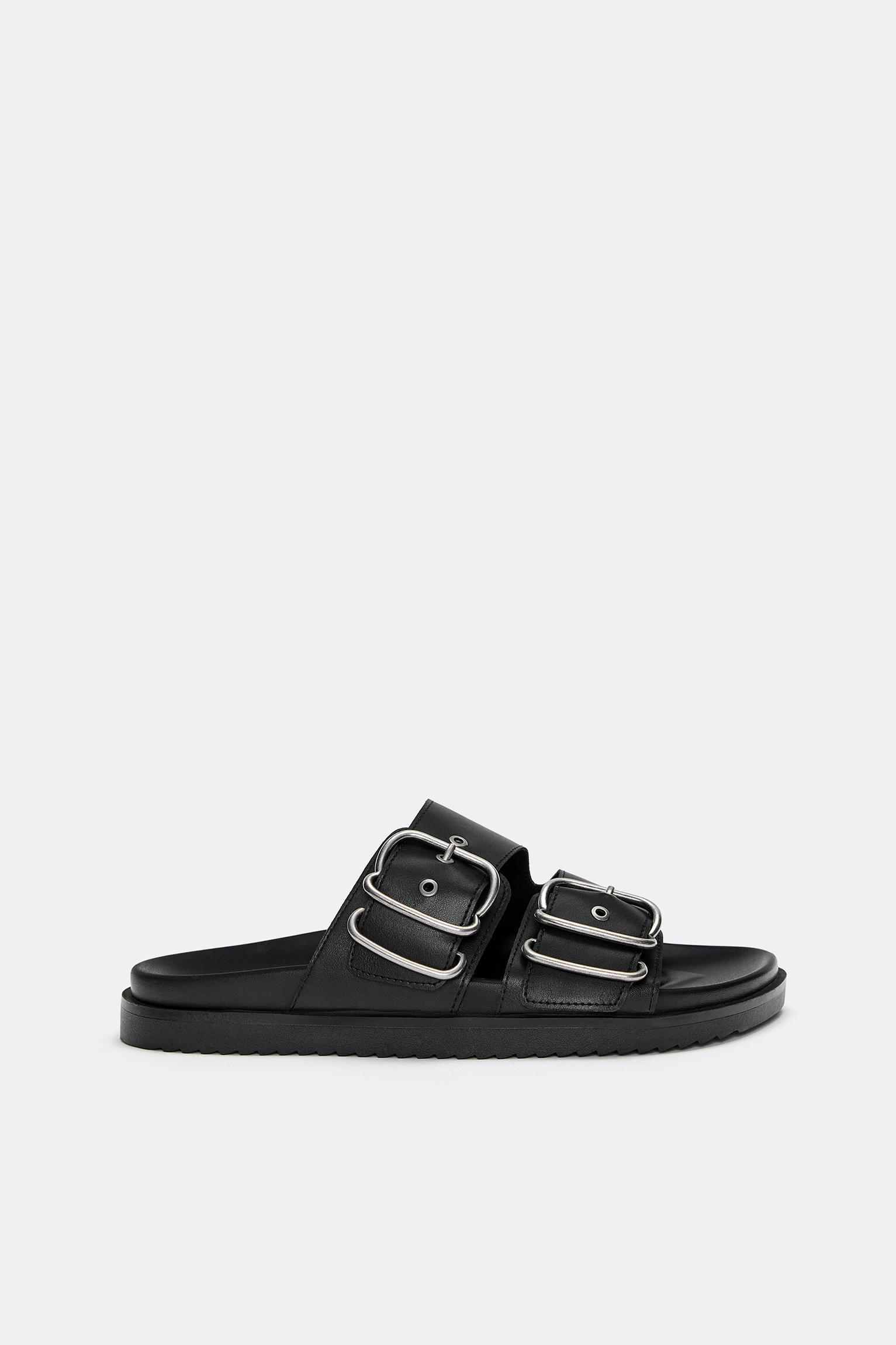 Flat sandals with buckles Product Image