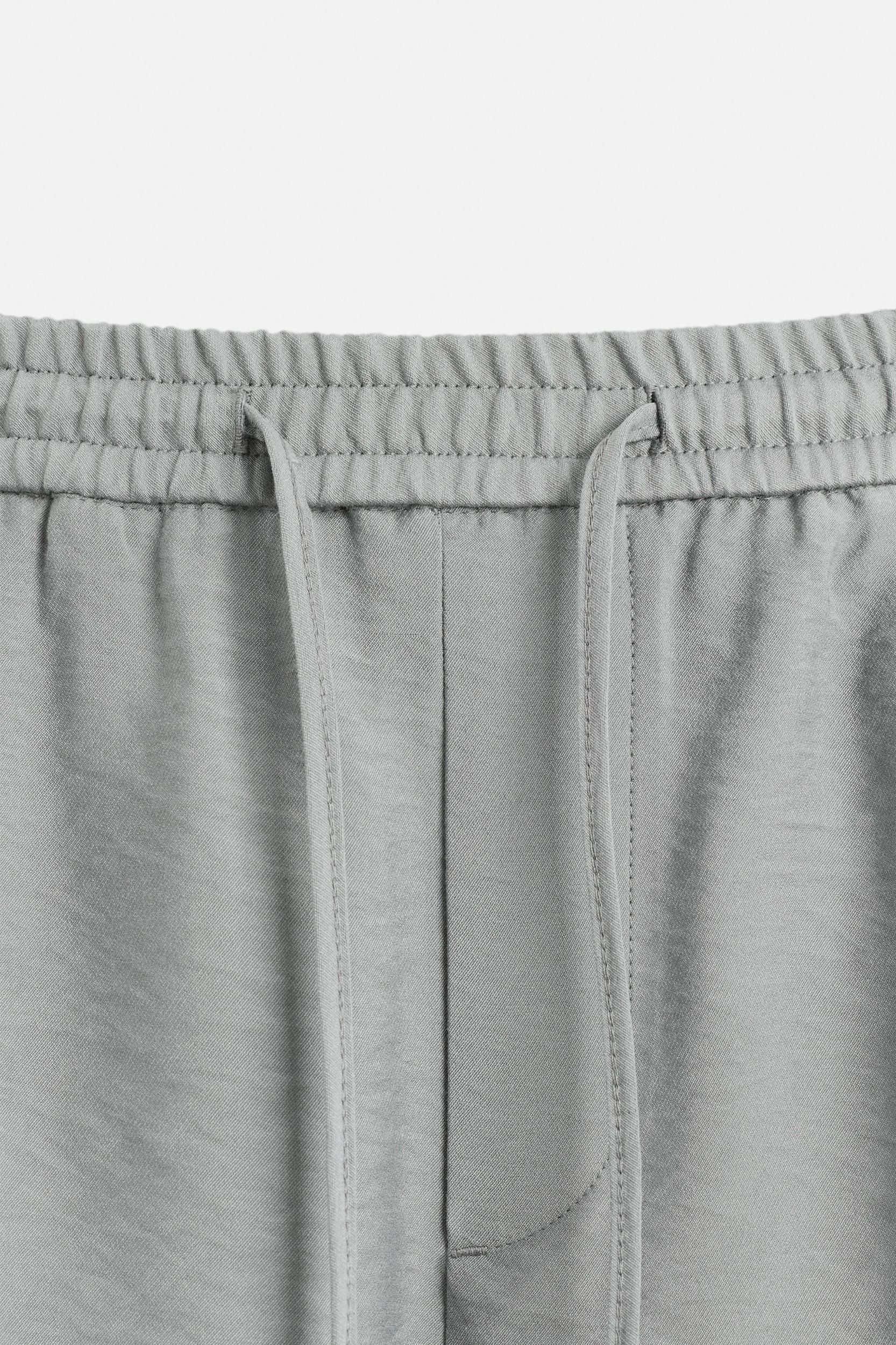 FLOWY RELAXED FIT BERMUDA SHORTS Product Image