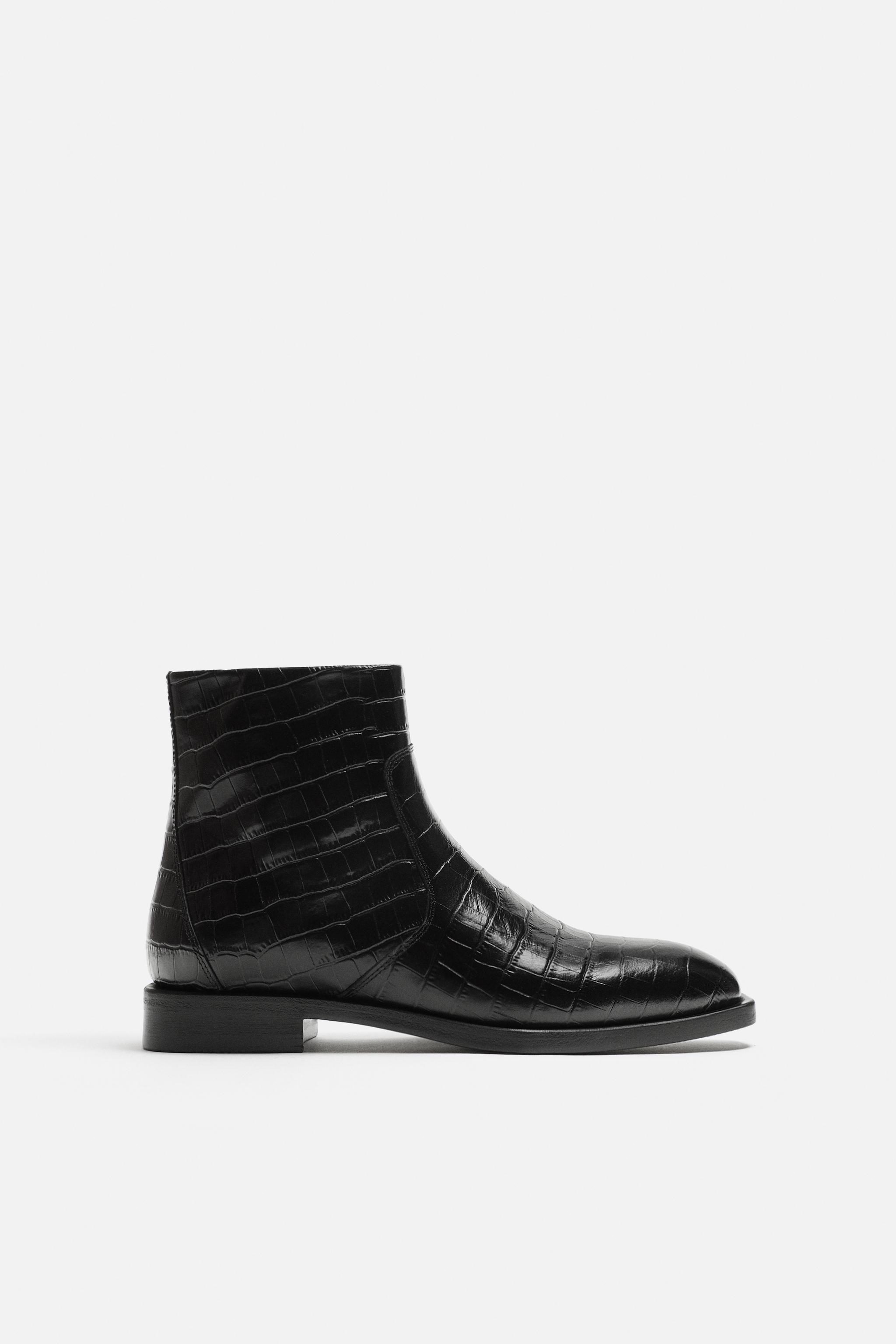 EMBOSSED LEATHER BOOTS Product Image