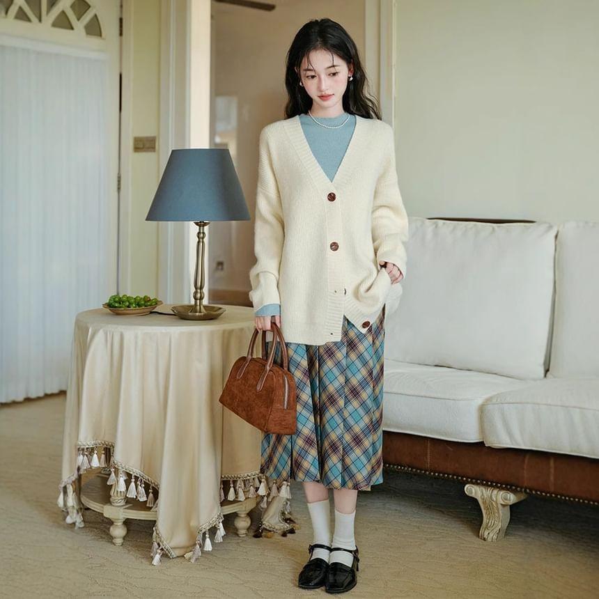 Long-Sleeve Mock Neck Plain Knit Top / V-Neck Cardigan / High Waist Plaid Pleated Midi A-Line Skirt / Set Product Image